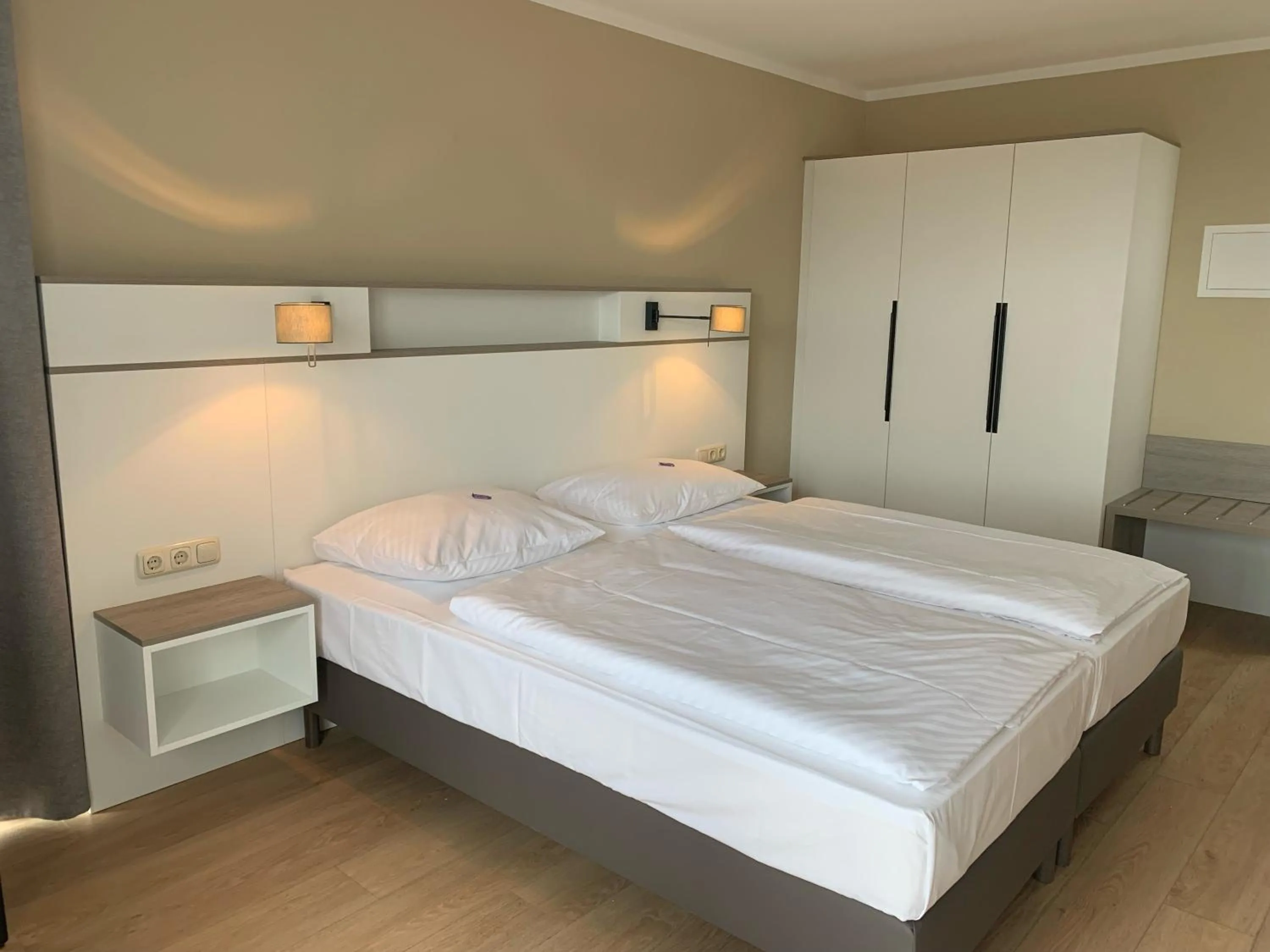 Bed in Hotel Goor und Apartmenthaus