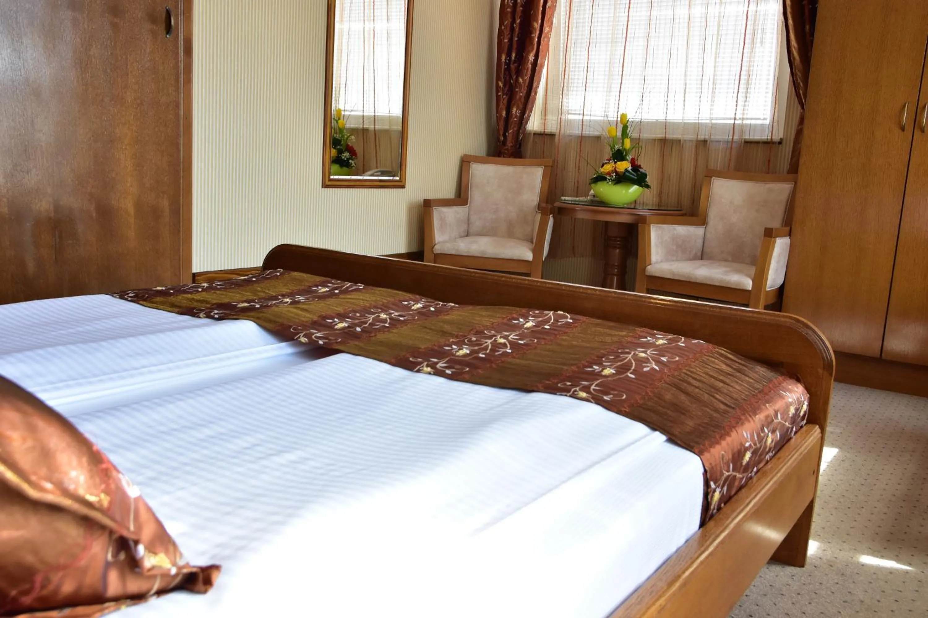 Bed in Garni Hotel Lav