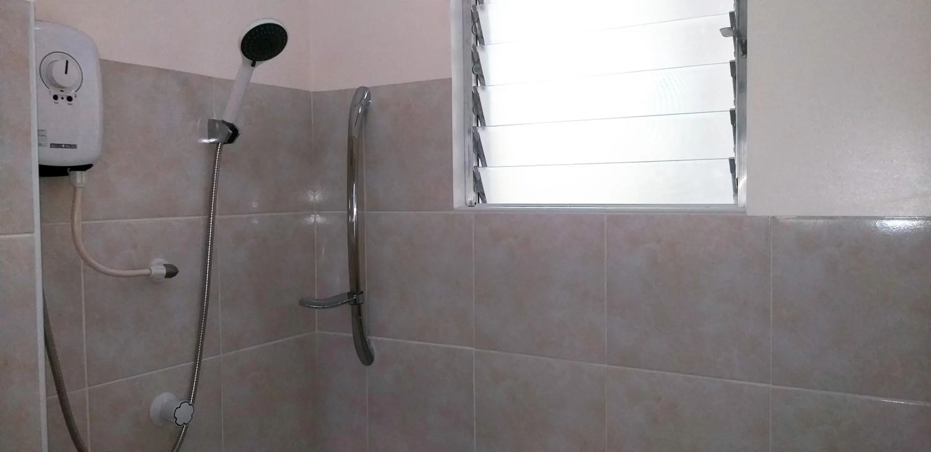 Shower in High Steps Pension