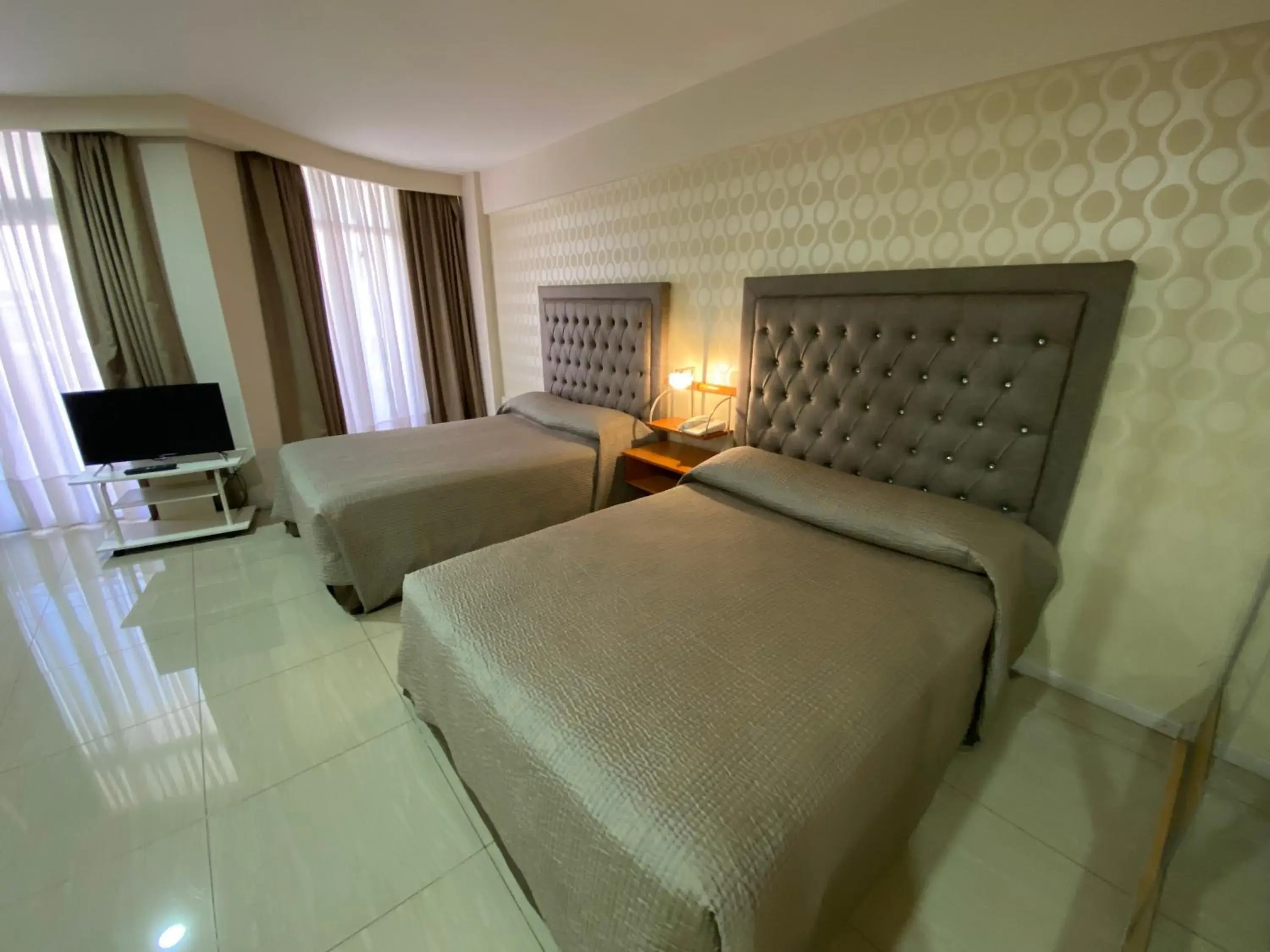 Bed in Hotel Howard Johnson Rosario Bed in Hotel Howard Johnson Rosario