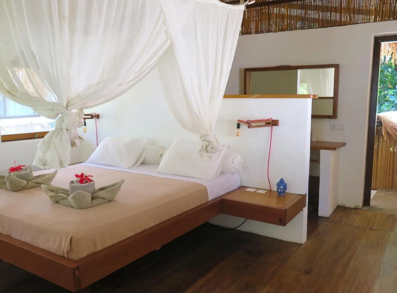 Decorative detail, Bed in Coral Eye Boutique Resort and Marine Outpost