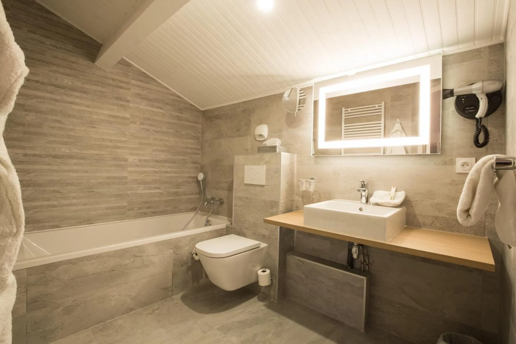 Bathroom in Logis Hotel Le Petit Casset