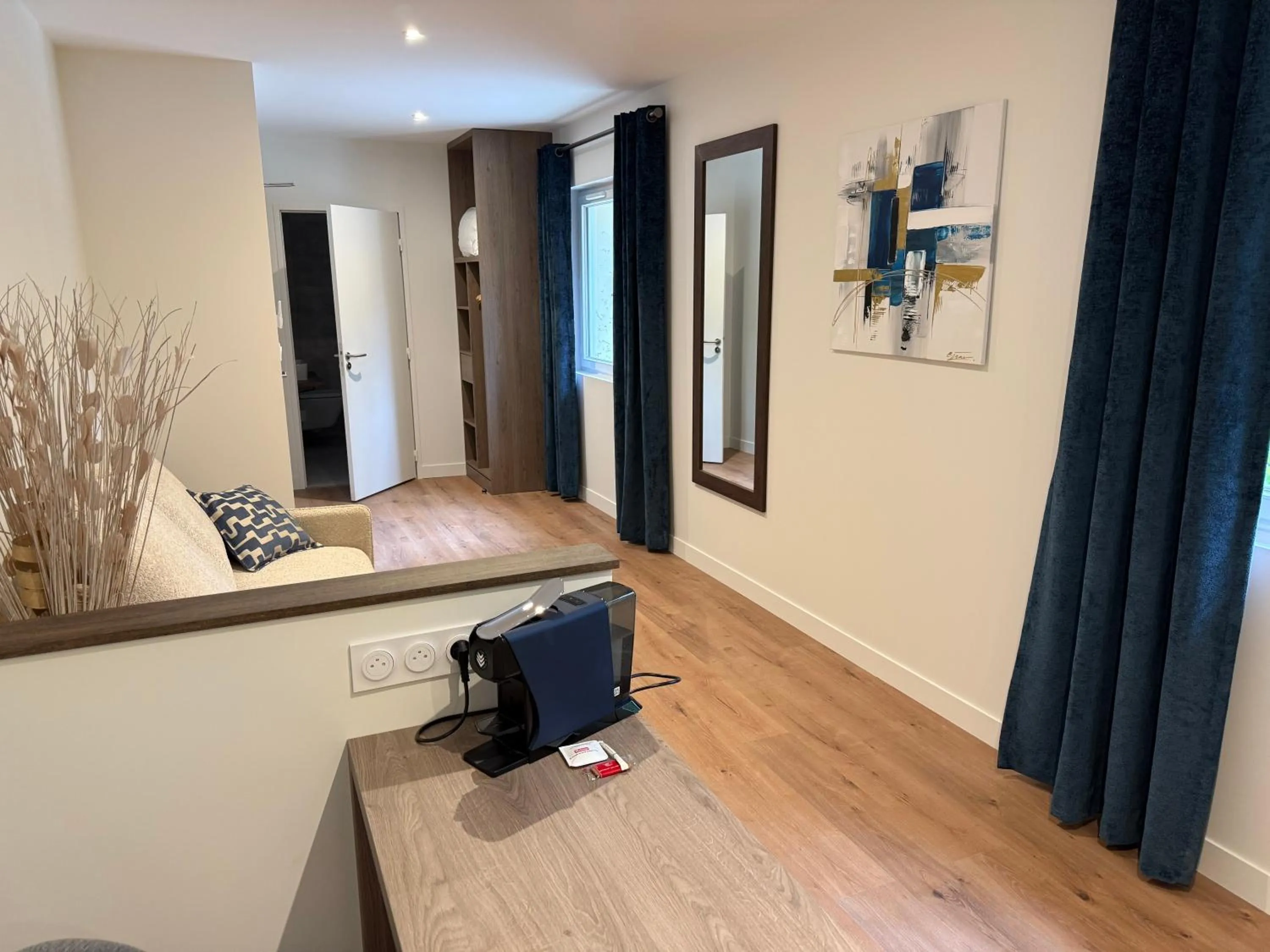 Seating area in Logis Hotel Le Petit Casset