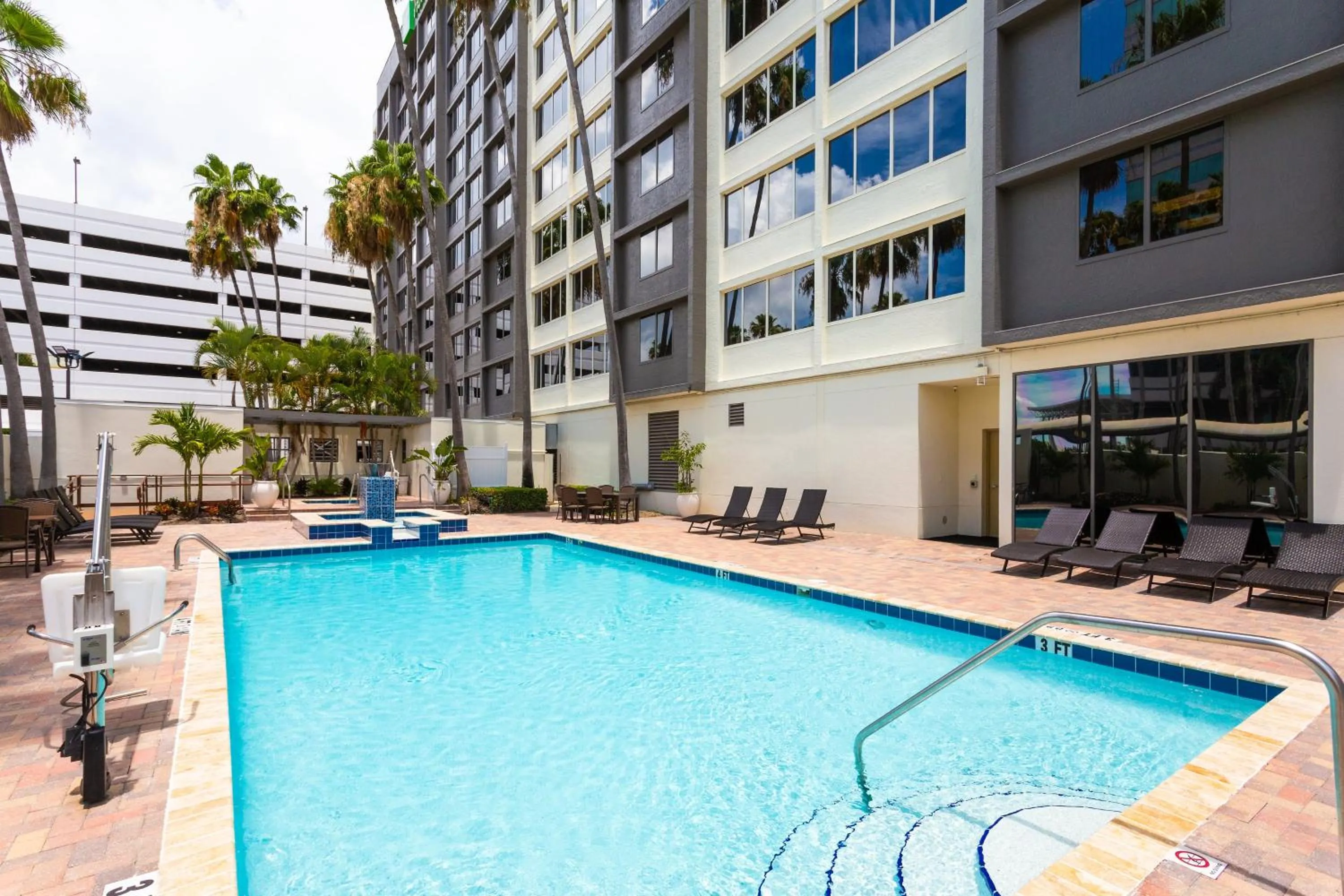 Swimming pool in Holiday Inn Tampa Westshore - Airport Area by IHG