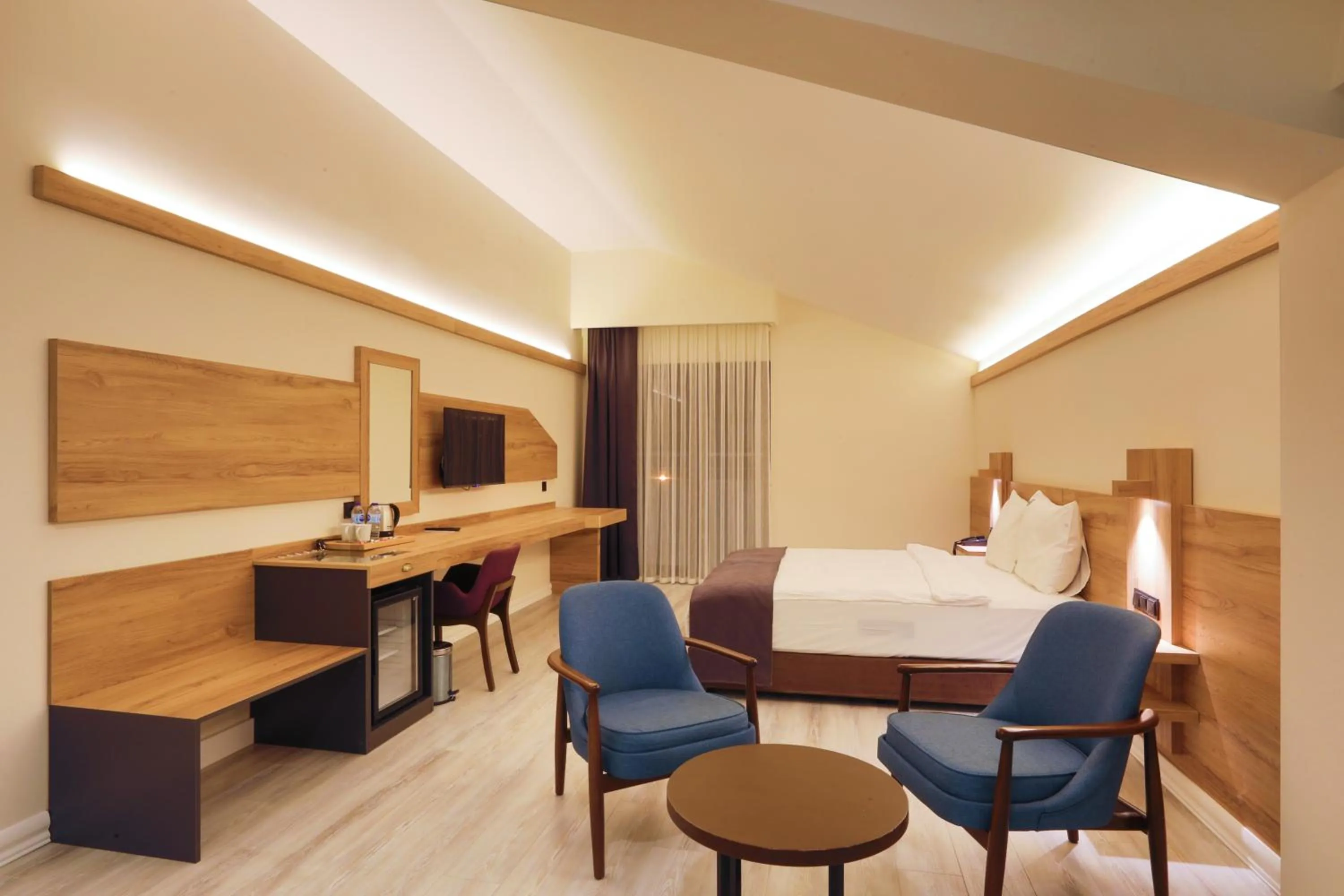 Bed in Karpalas City Hotel & Spa