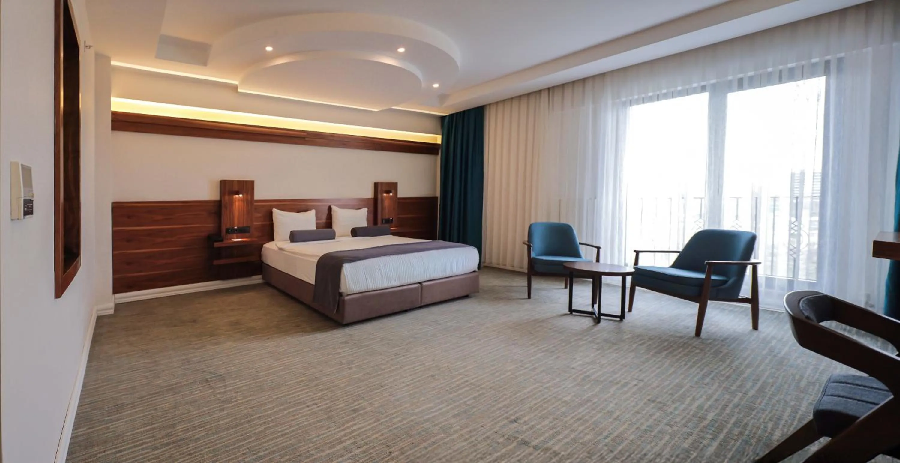 Bed in Karpalas City Hotel & Spa