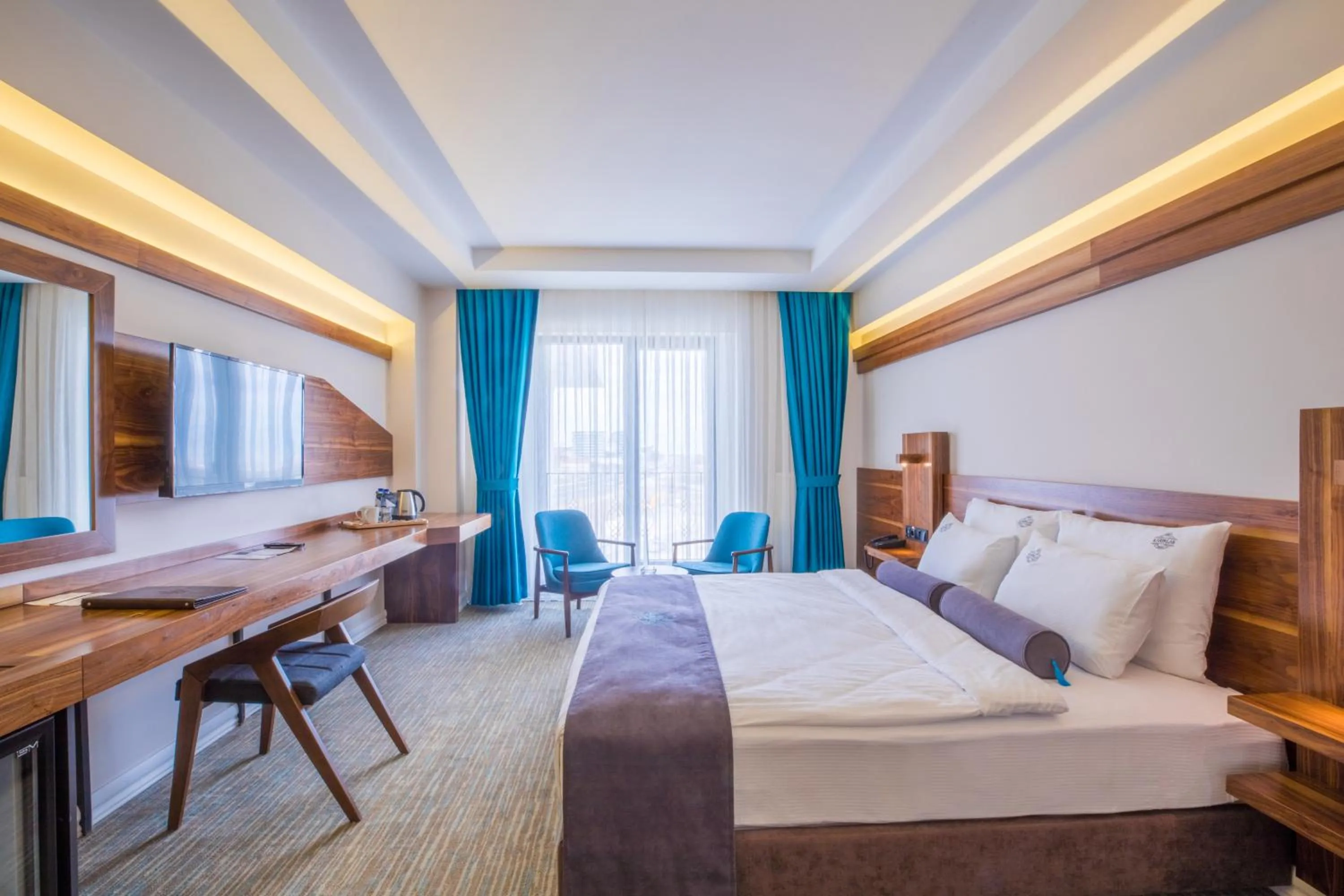 Bed in Karpalas City Hotel & Spa