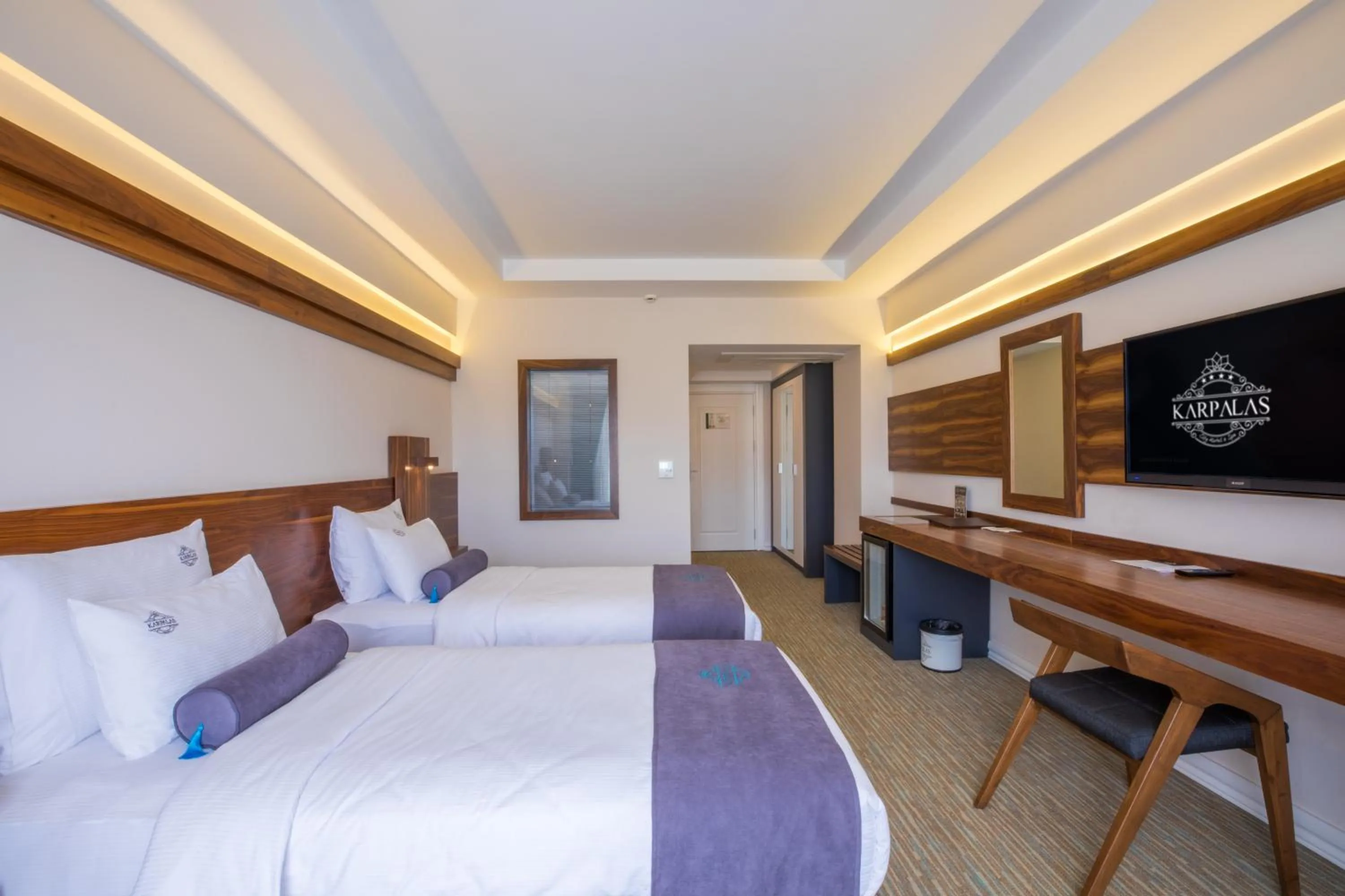 Bed in Karpalas City Hotel & Spa