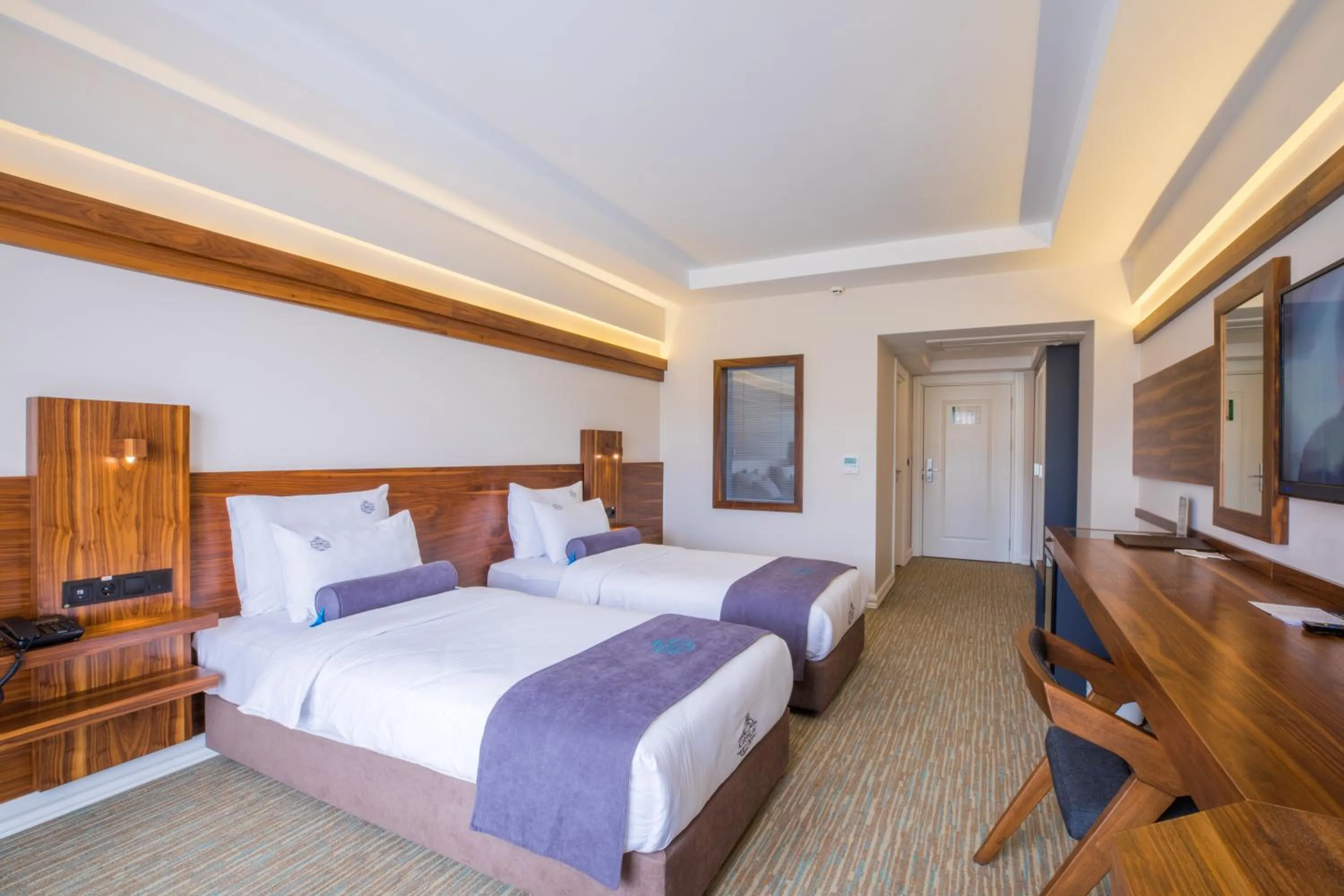 Bed in Karpalas City Hotel & Spa