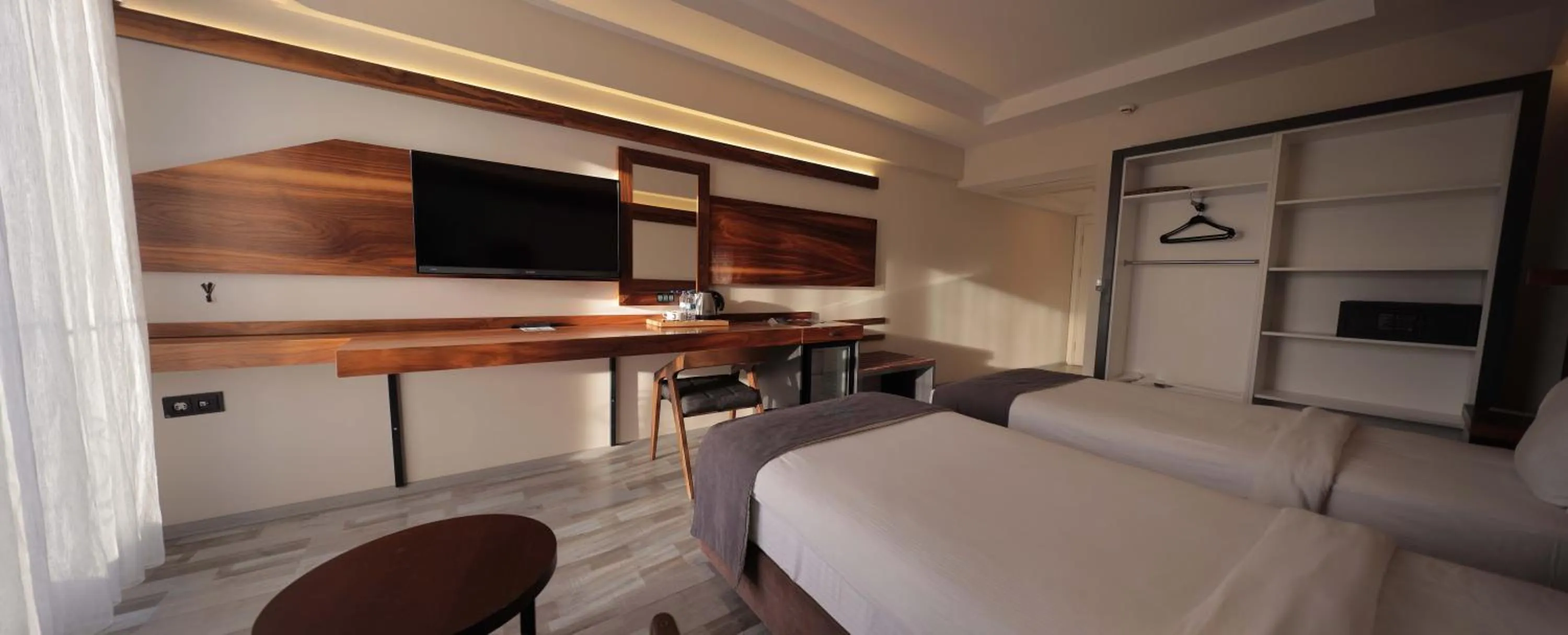 Bed in Karpalas City Hotel & Spa