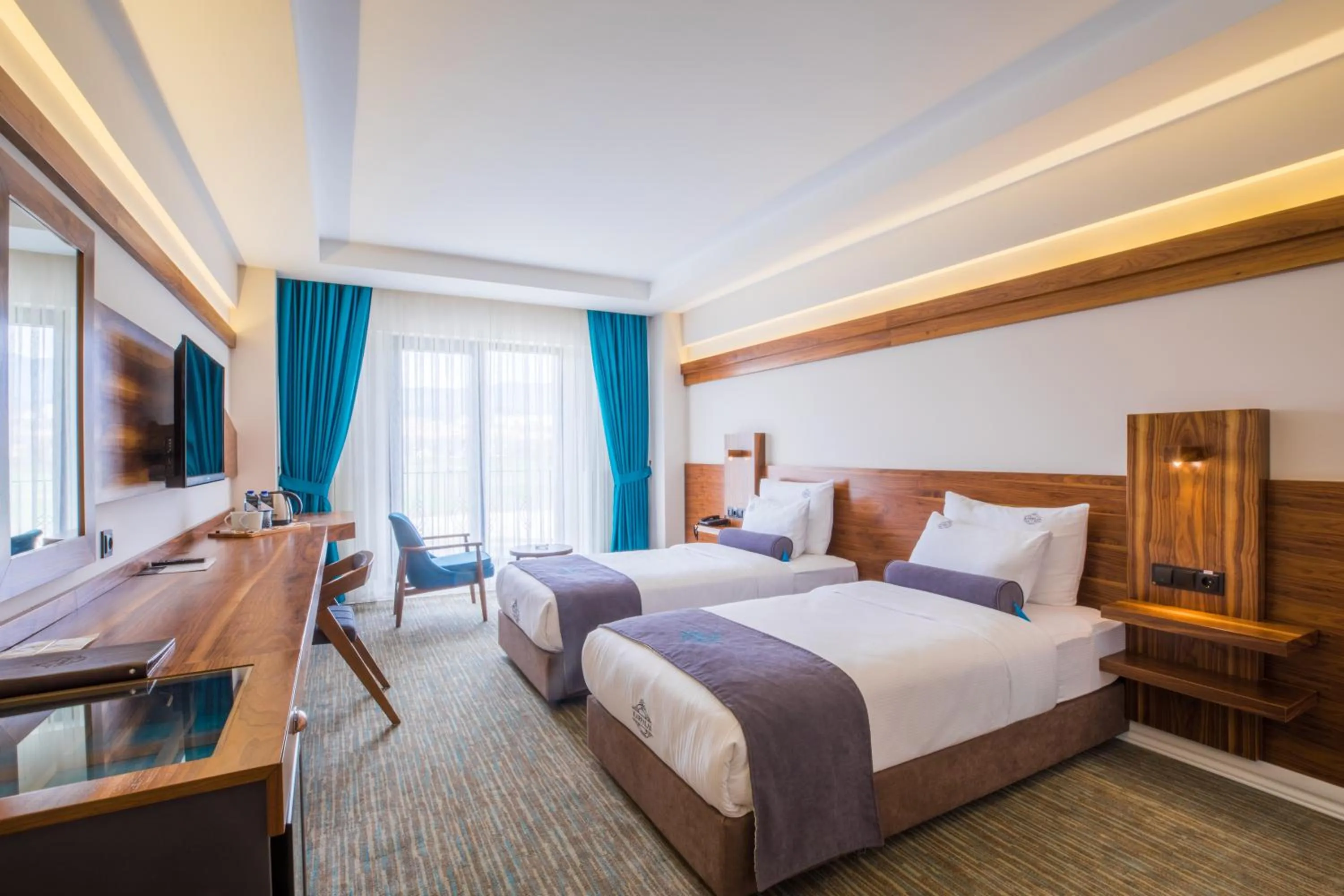 Bed in Karpalas City Hotel & Spa