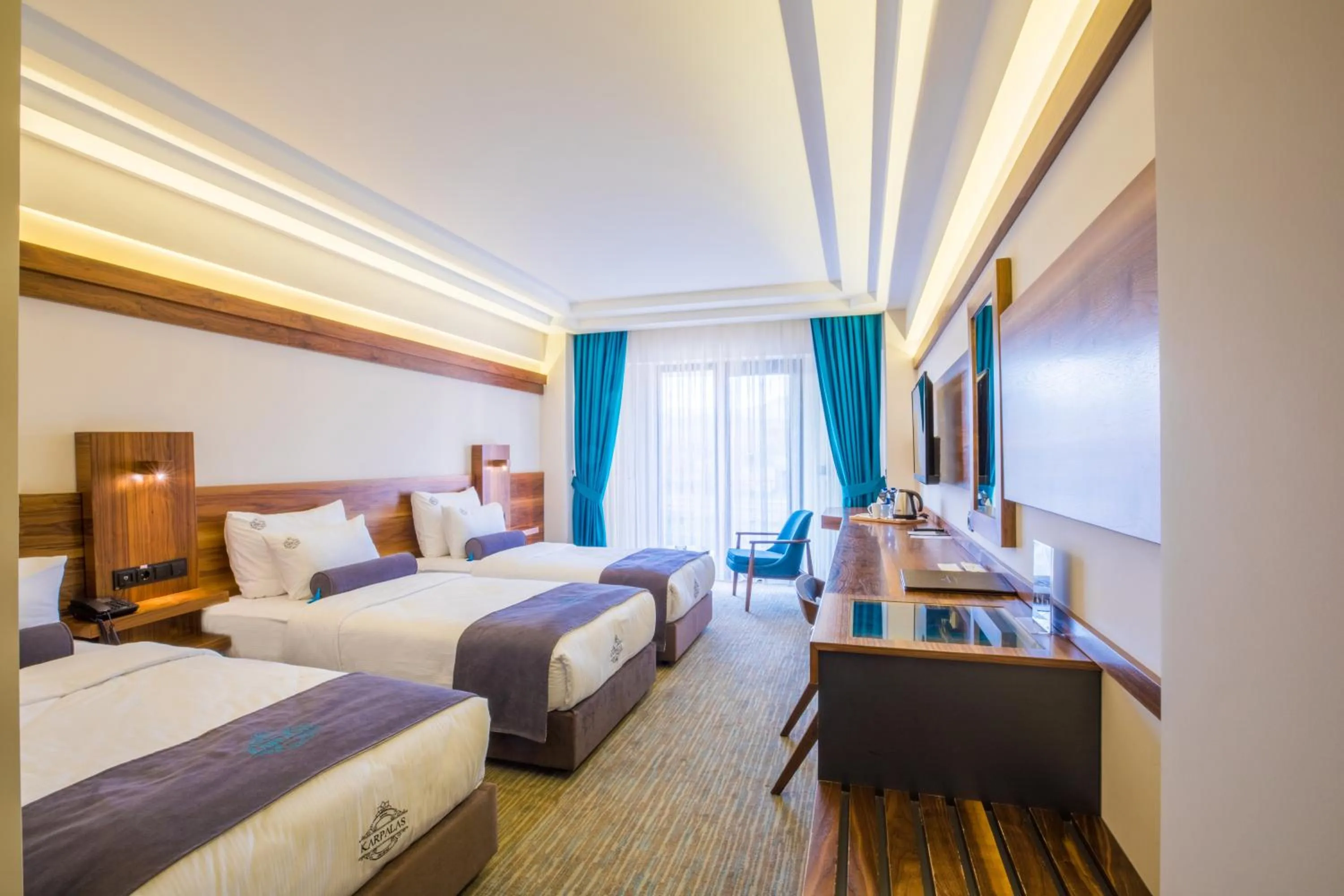 Bed in Karpalas City Hotel & Spa