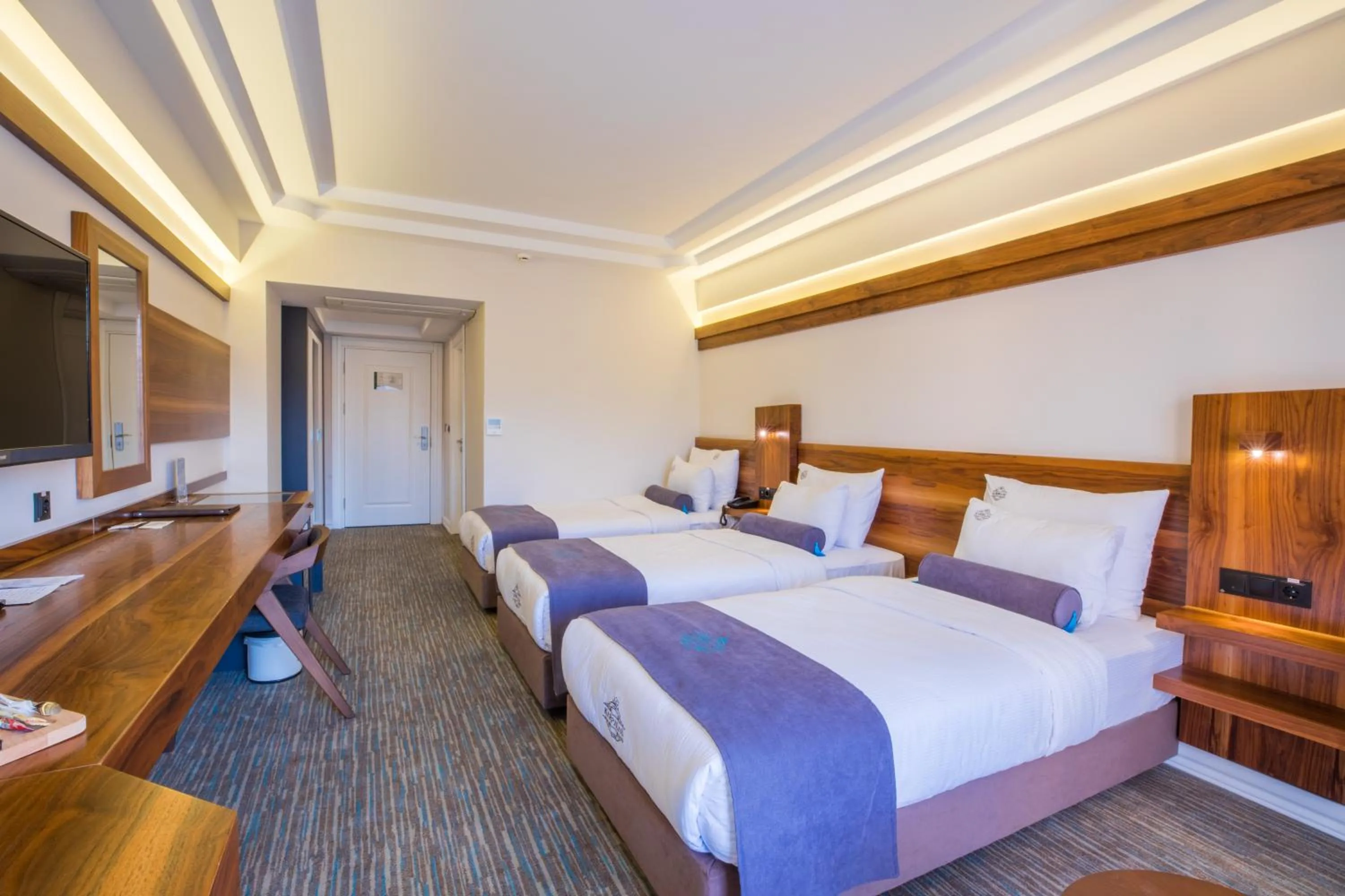 Bed in Karpalas City Hotel & Spa
