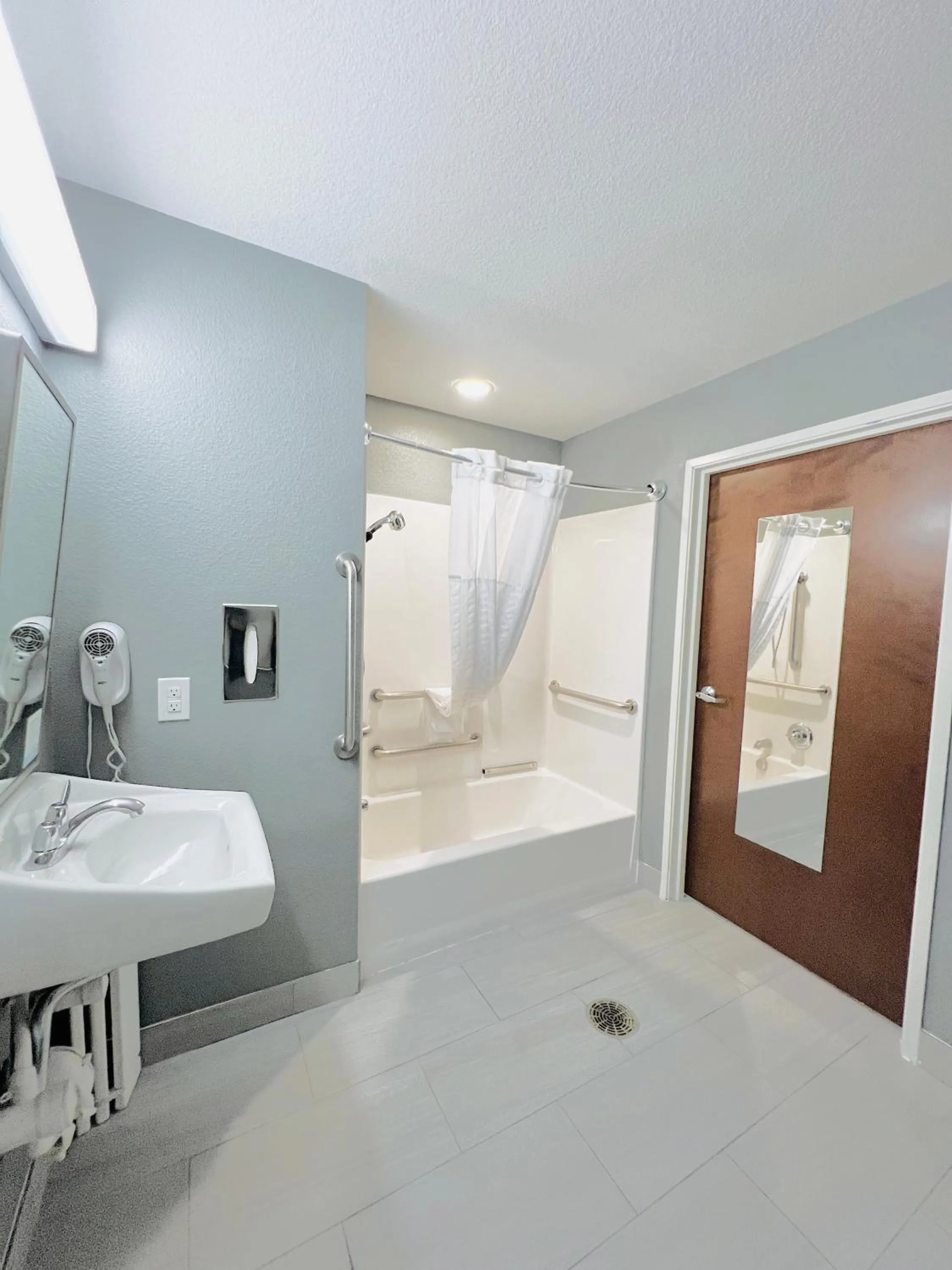 Bathroom in Microtel Inn & Suites by Wyndham Austin Airport