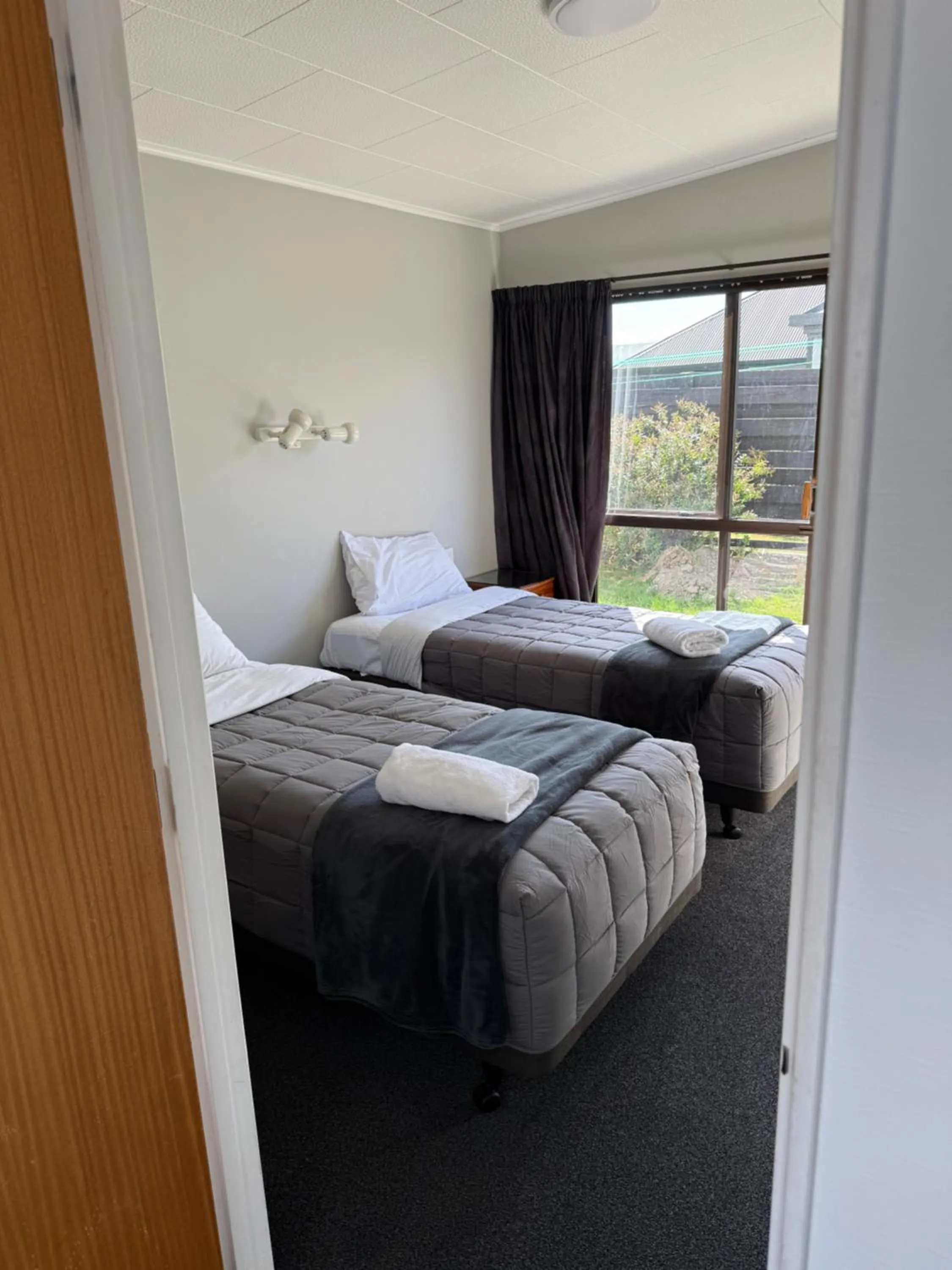 Bed in Sundowner Motel