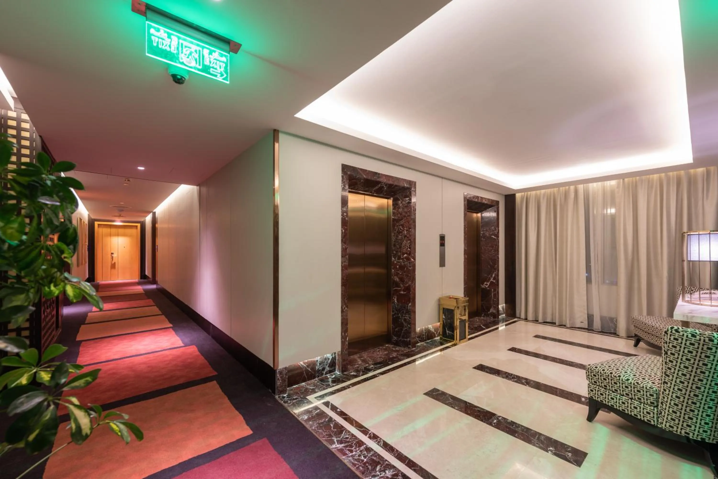 Facade/entrance, Bed in Ramada Hotel & Suites by Wyndham Al Qassim