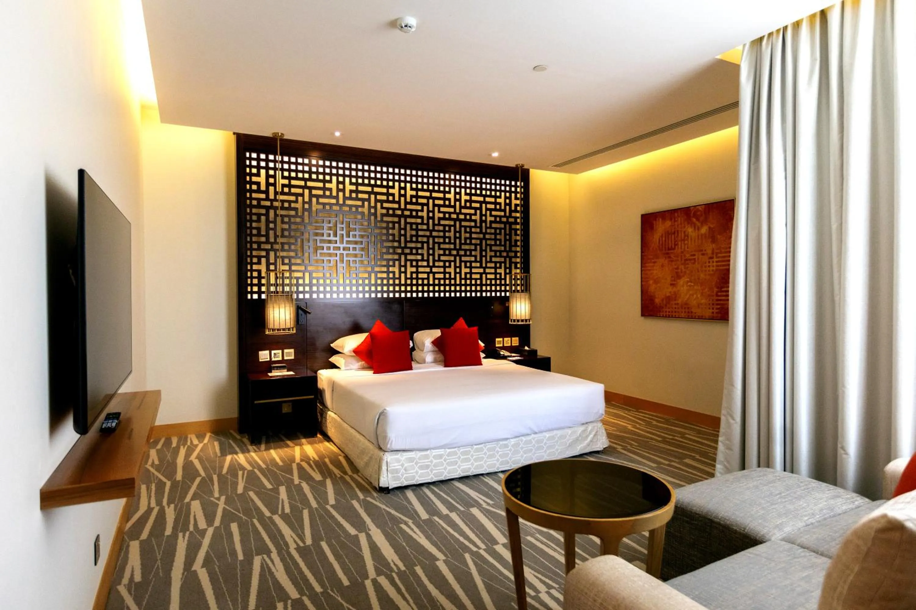 Bedroom, Bed in Ramada Hotel & Suites by Wyndham Al Qassim
