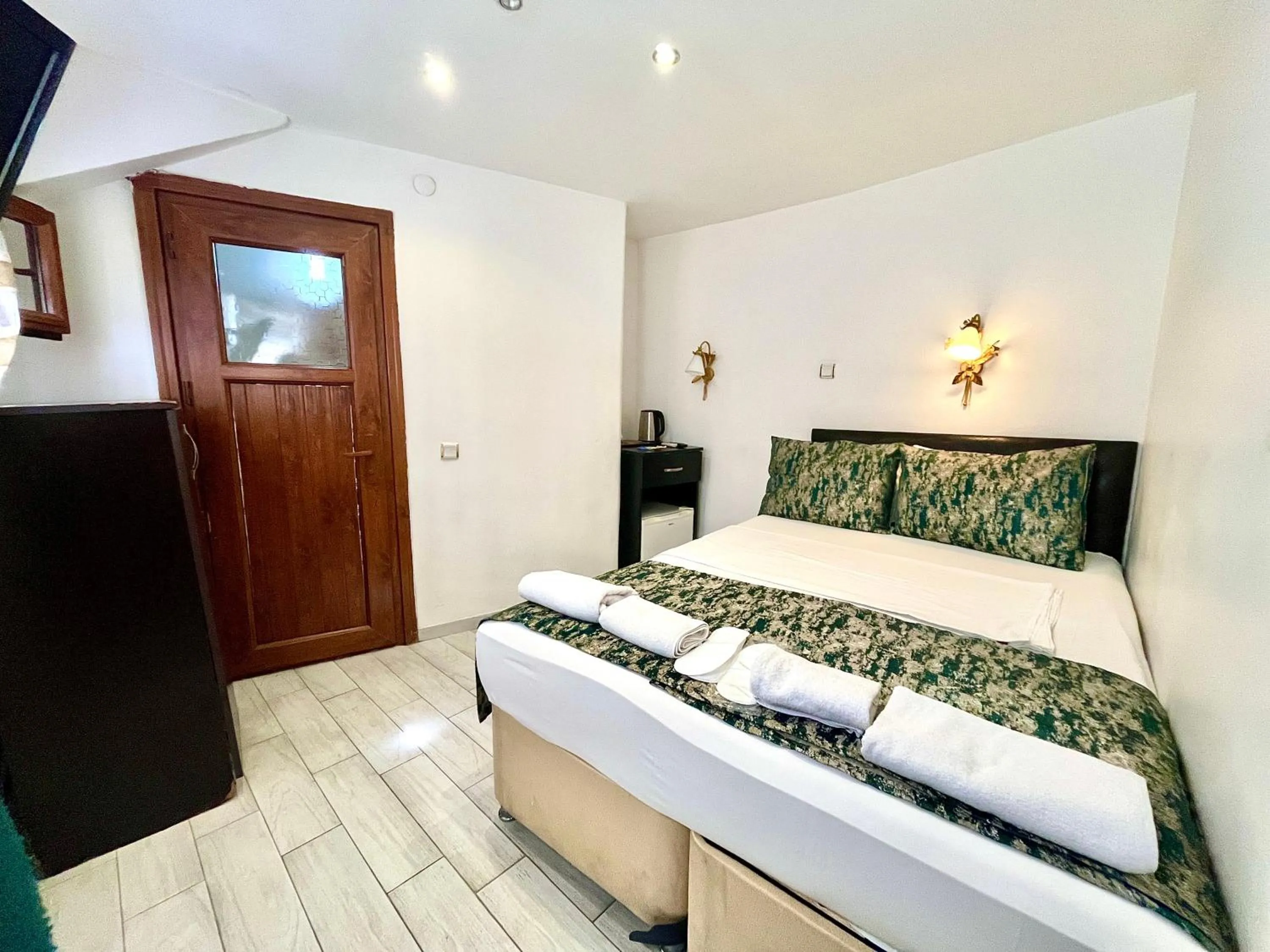 Bed in Magnificent Hotel