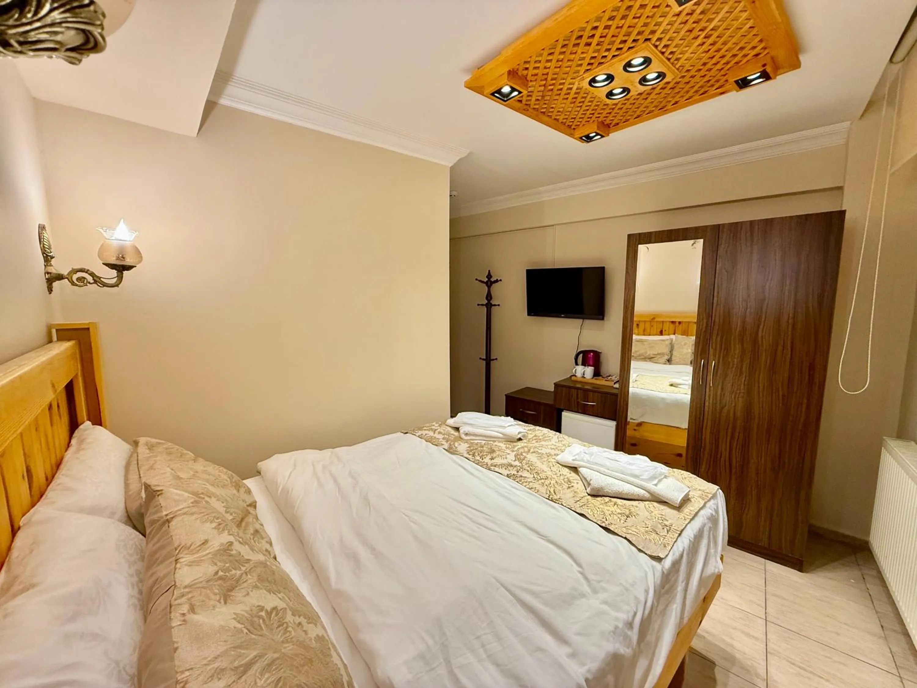 Bed in Magnificent Hotel