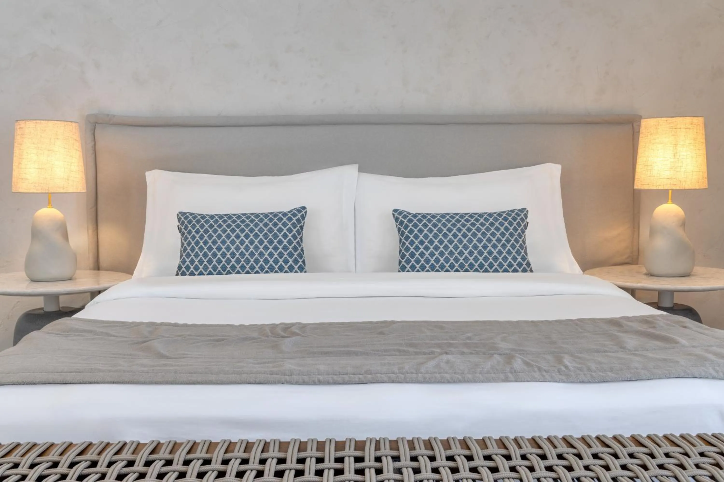 Bed in Patmos Aktis, a Luxury Collection Resort & Spa, Greece