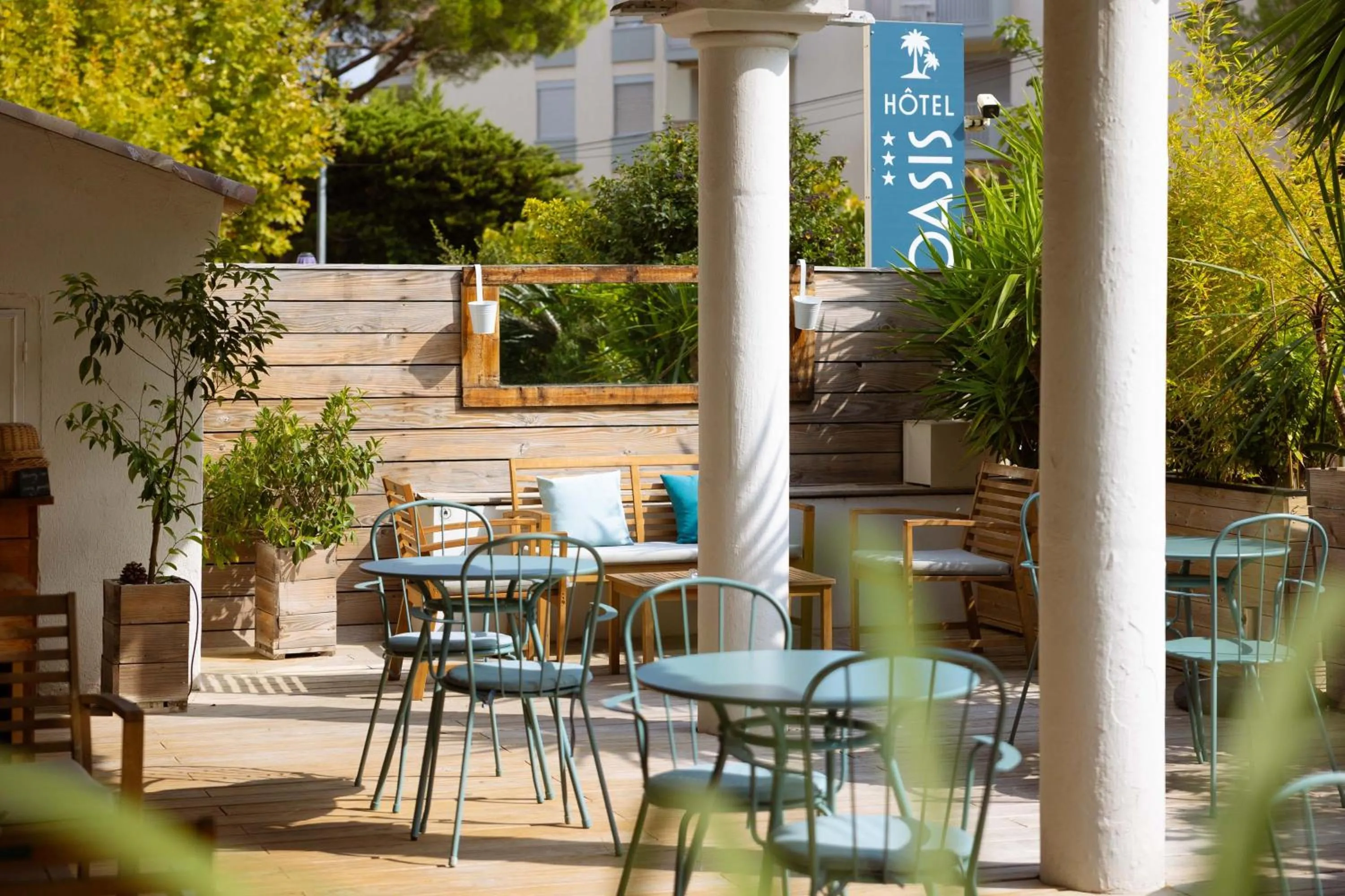 Patio in L'Oasis Hotel