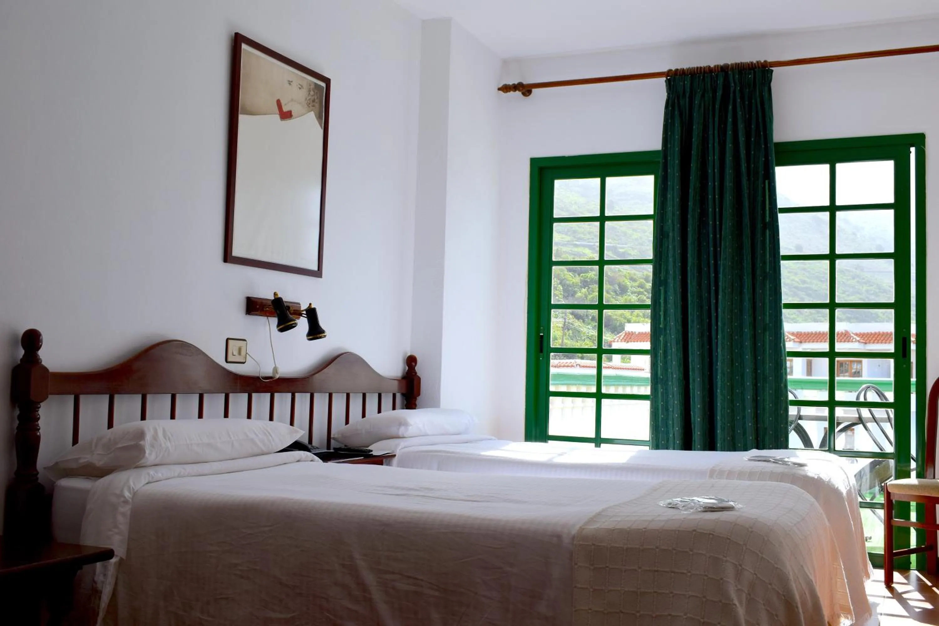 Balcony/Terrace, Bed in Hotel Ida Inés