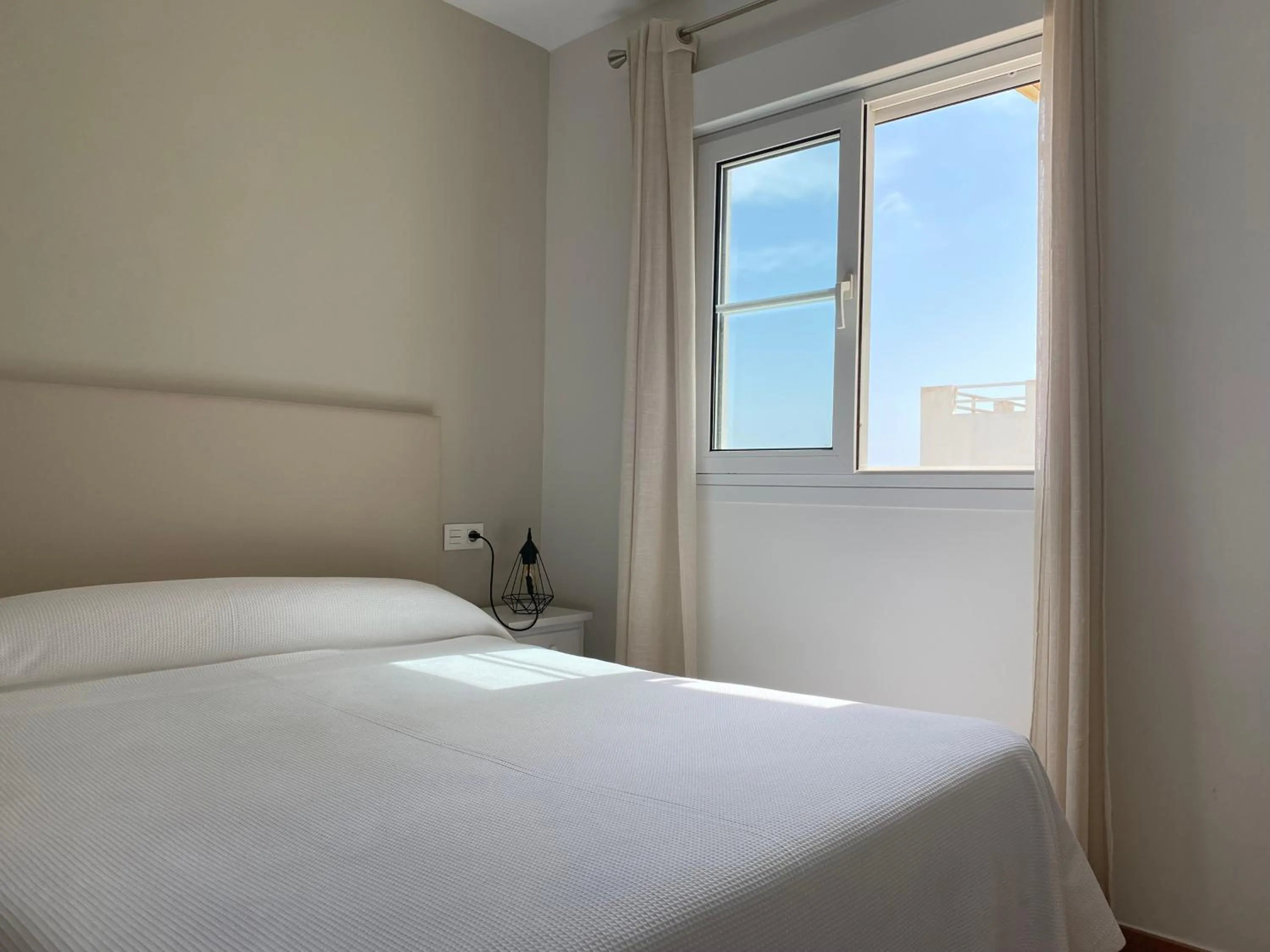 Bedroom, Bed in Apartahotel Vistamar San José