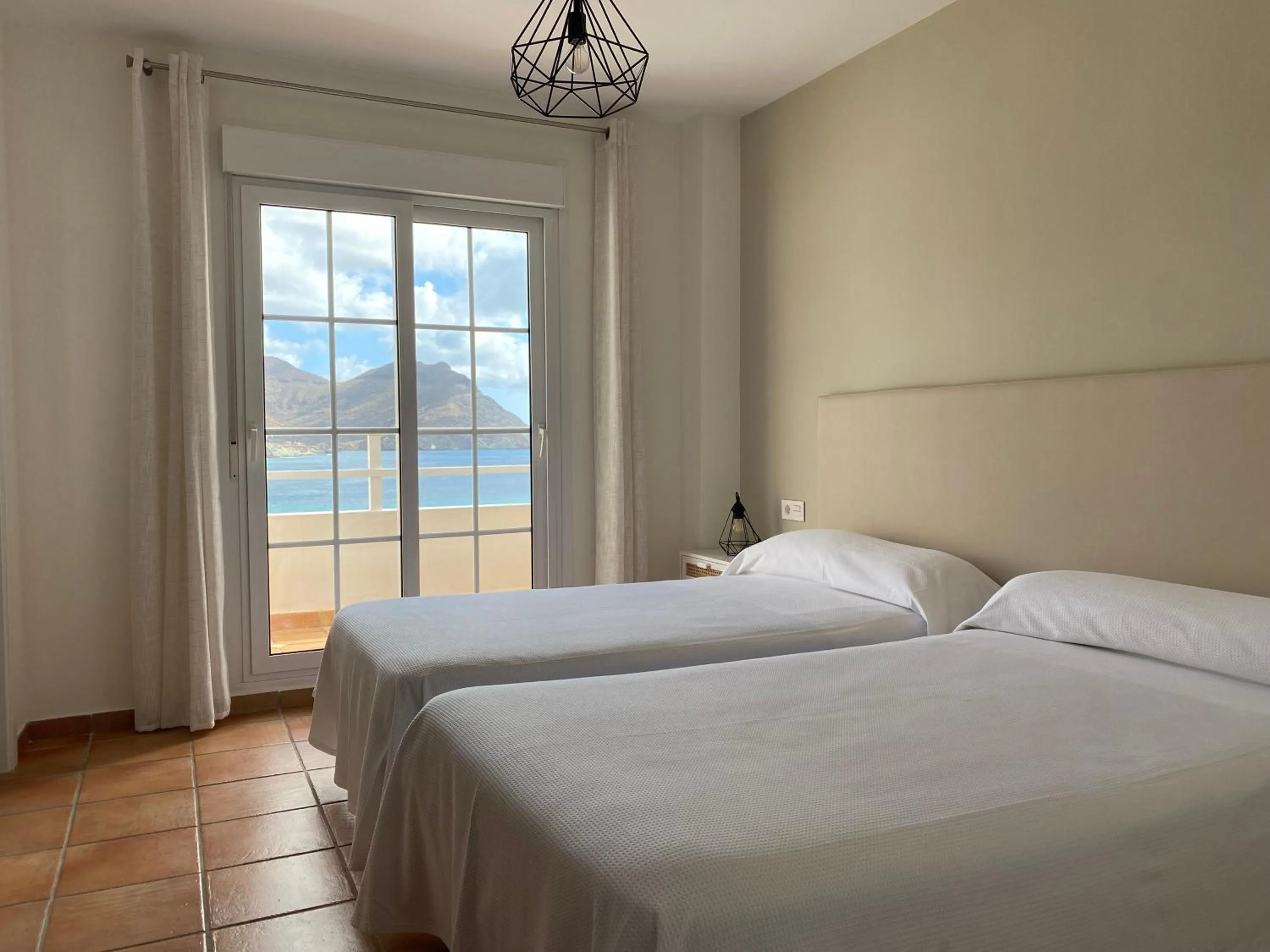 Bedroom, Bed in Apartahotel Vistamar San José