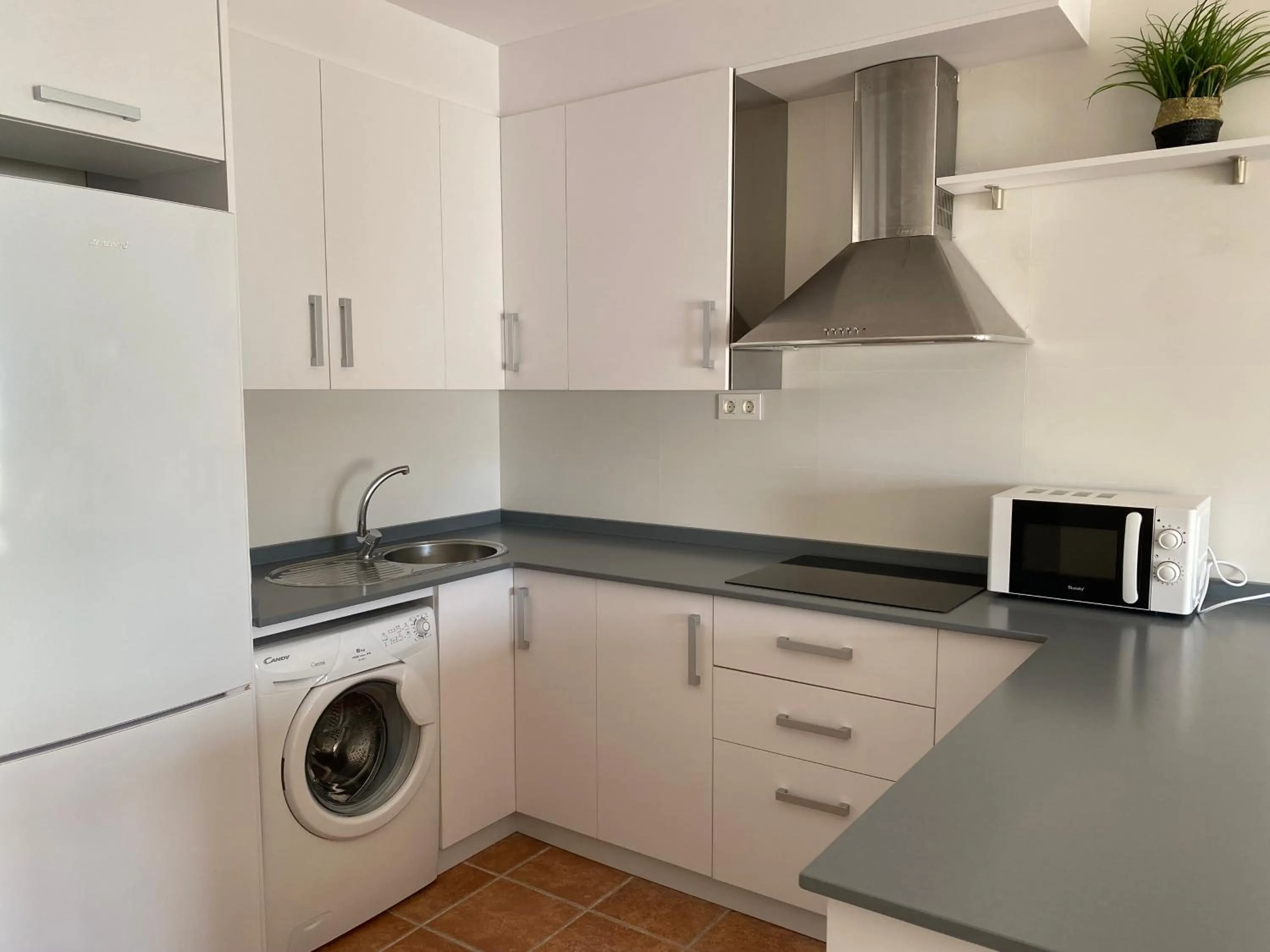 kitchen in Apartahotel Vistamar San José