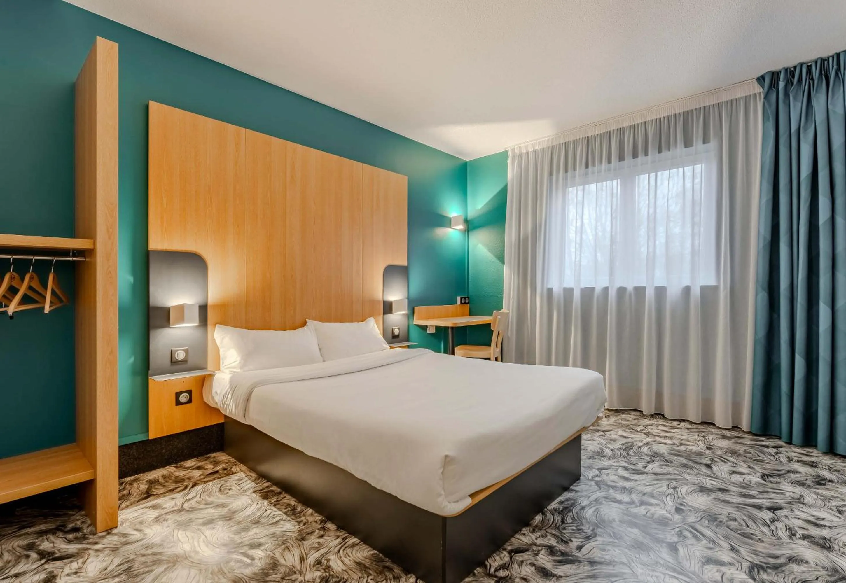 Bed in B&B HOTEL Maubeuge-Louvroil