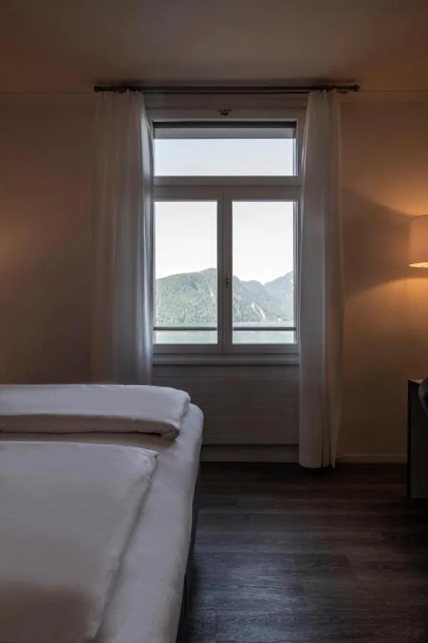 Bed in Hotel Vitznauerhof - Lifestyle Hideaway at Lake Lucerne