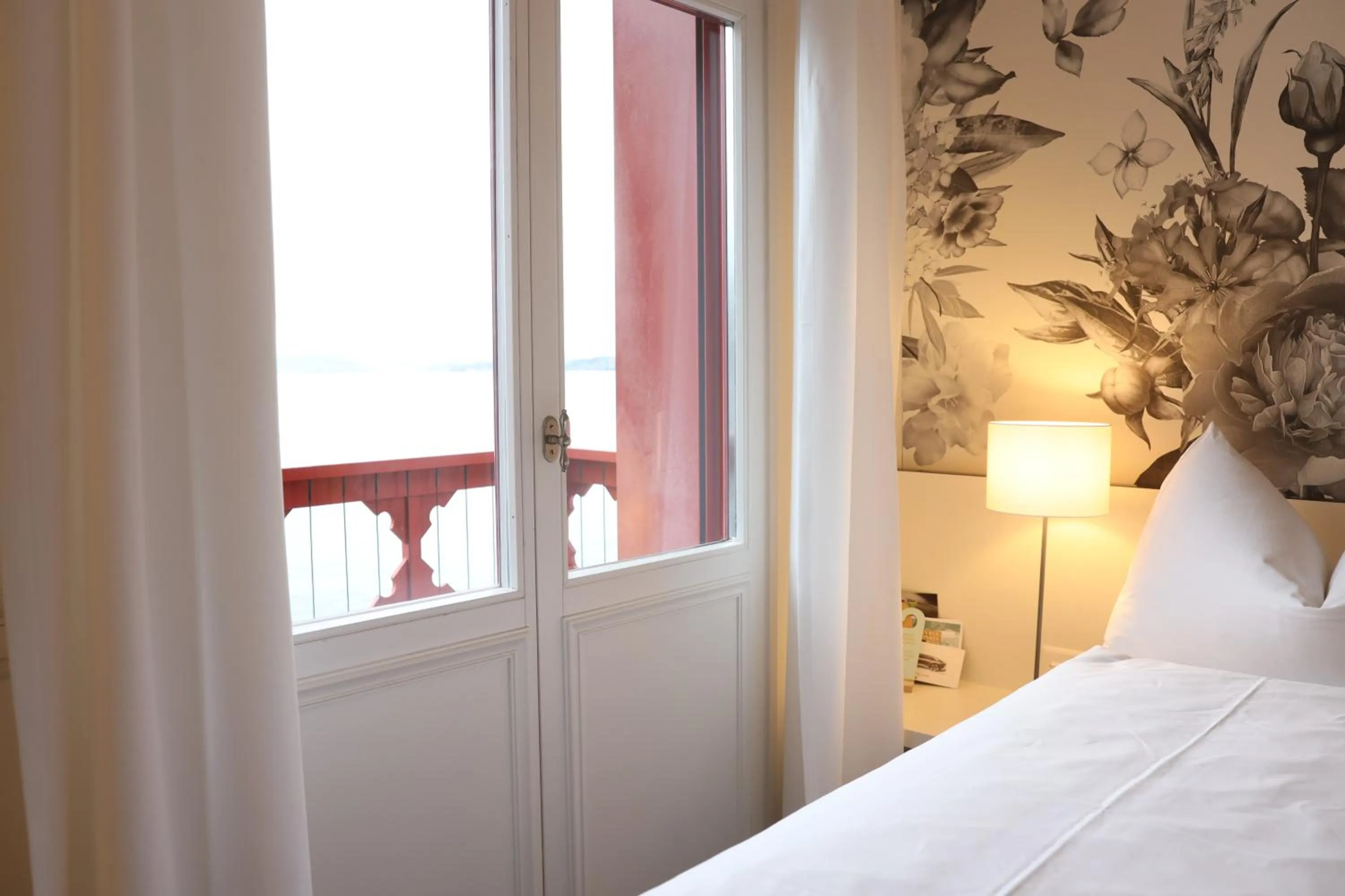 Photo of the whole room, Bed in Hotel Vitznauerhof - Lifestyle Hideaway at Lake Lucerne