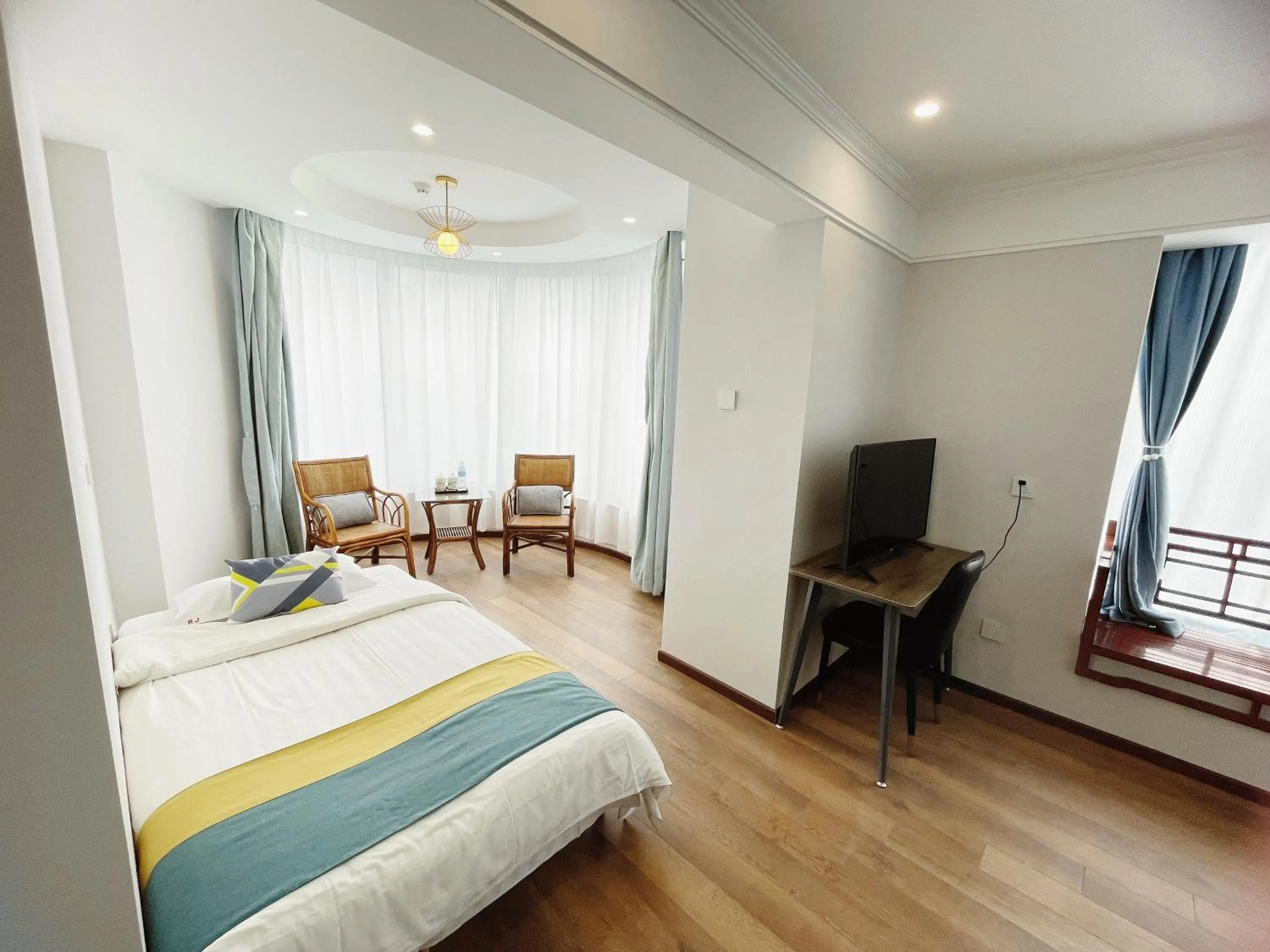 Living room, Bed in Beijing RJ Brown city center hotel Forbidden City &Tian'anmen Square ,Near Subway line 8, 3min walk to Temple of Heaven, English Speaking reception , Laundry service ,Free wifi ,Oneday tour to Greatwall