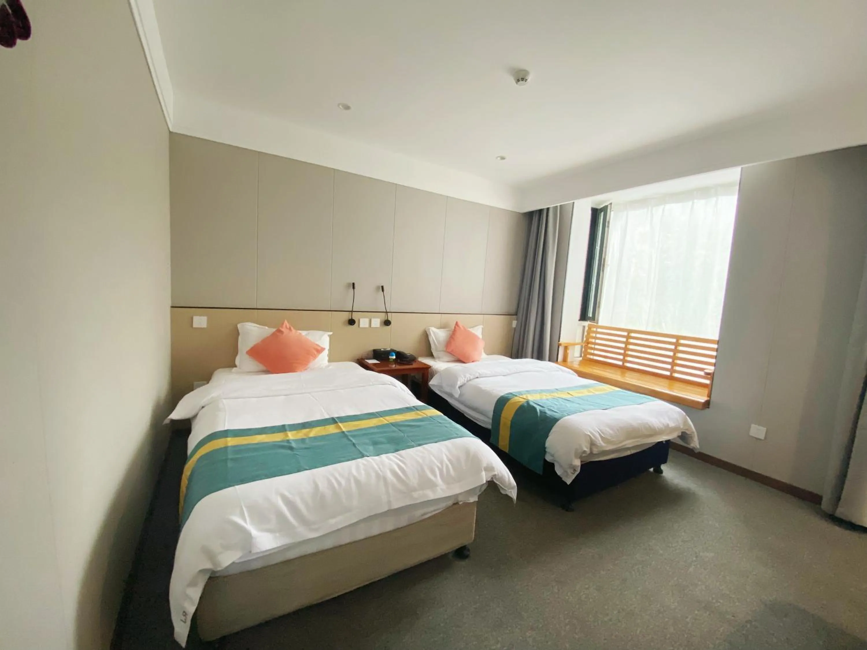 Bed in Beijing RJ Brown city center hotel Forbidden City &Tian'anmen Square ,Near Subway line 8, 3min walk to Temple of Heaven, English Speaking reception , Laundry service ,Free wifi ,Oneday tour to Greatwall