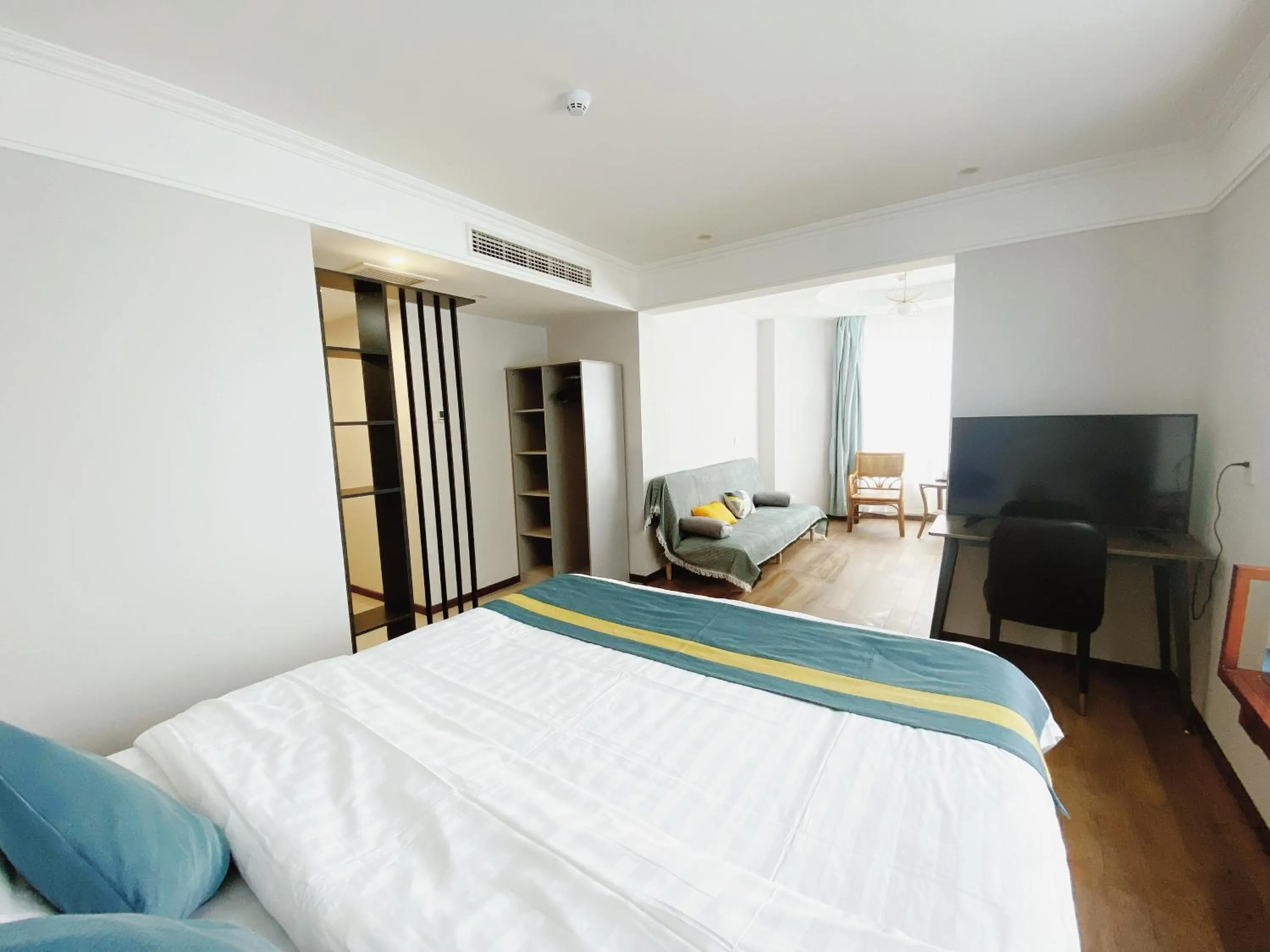 Living room, Bed in Beijing RJ Brown city center hotel Forbidden City &Tian'anmen Square ,Near Subway line 8, 3min walk to Temple of Heaven, English Speaking reception , Laundry service ,Free wifi ,Oneday tour to Greatwall