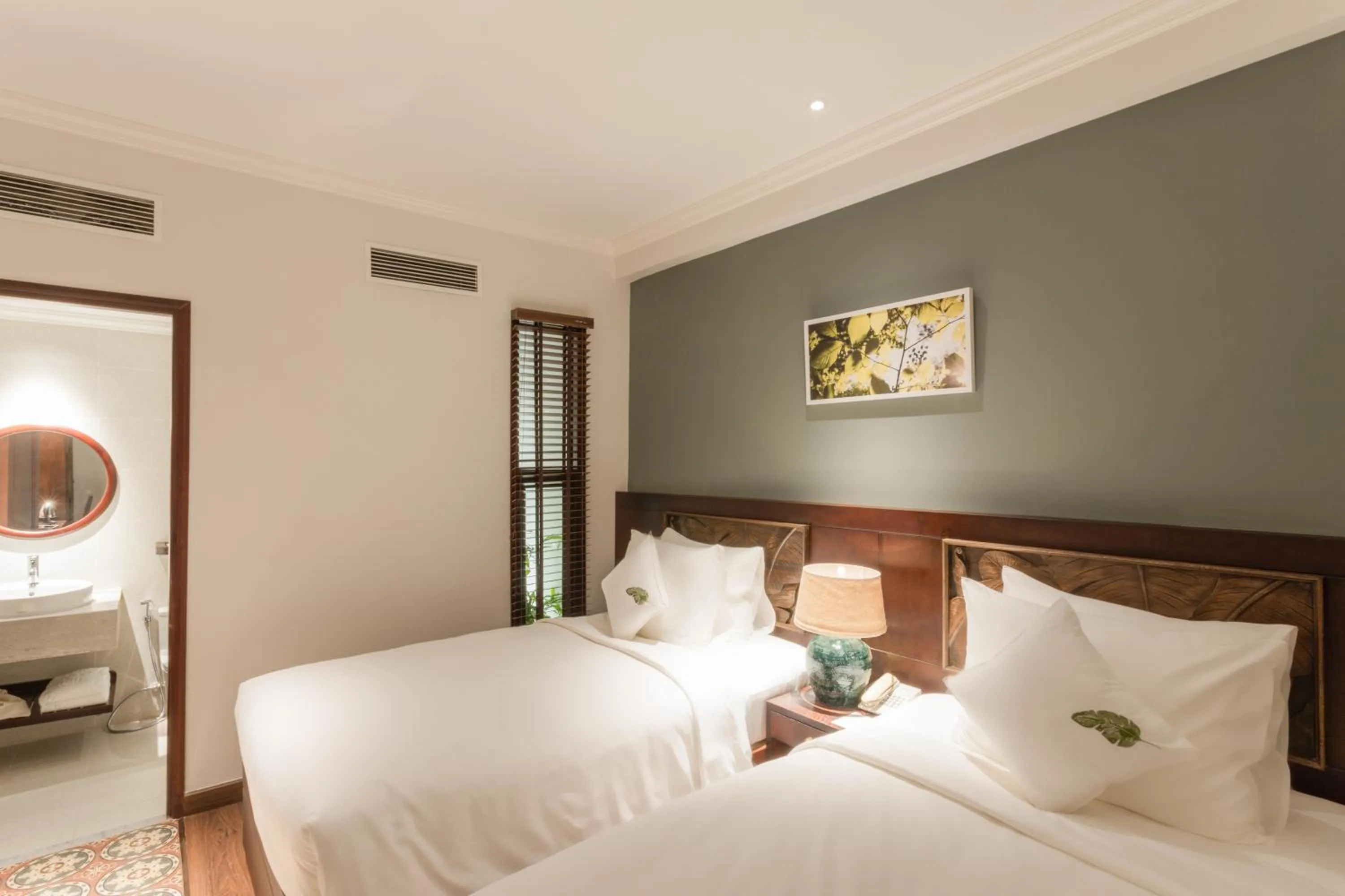 Bed in Cochin Sang Hotel