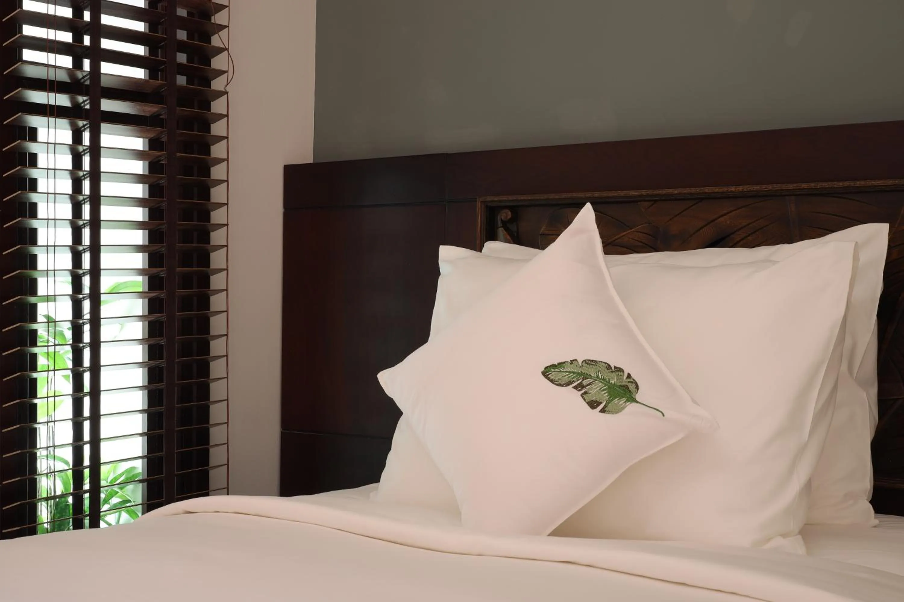 Bed in Cochin Sang Hotel