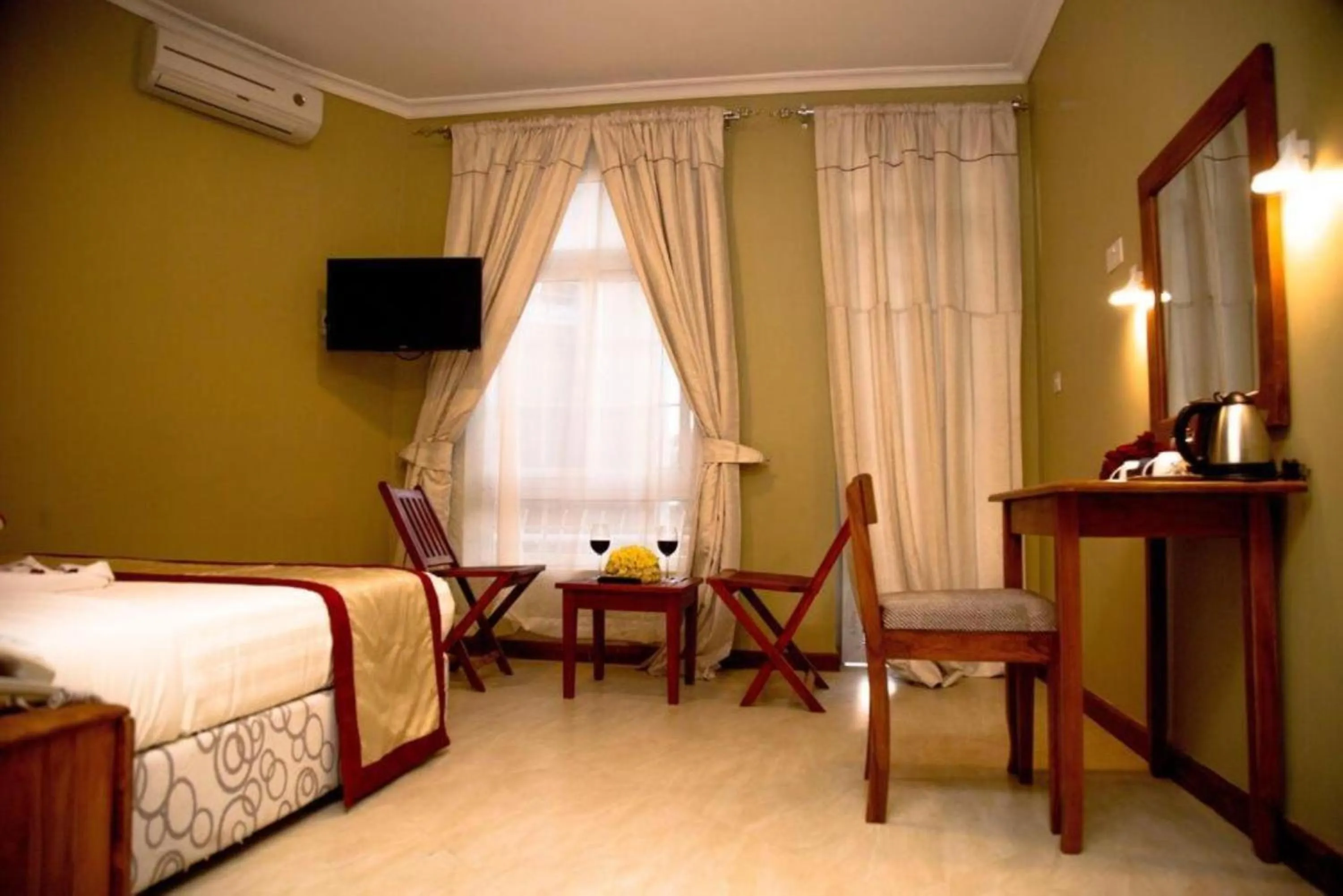 Bed in Masailand Safari Lodge