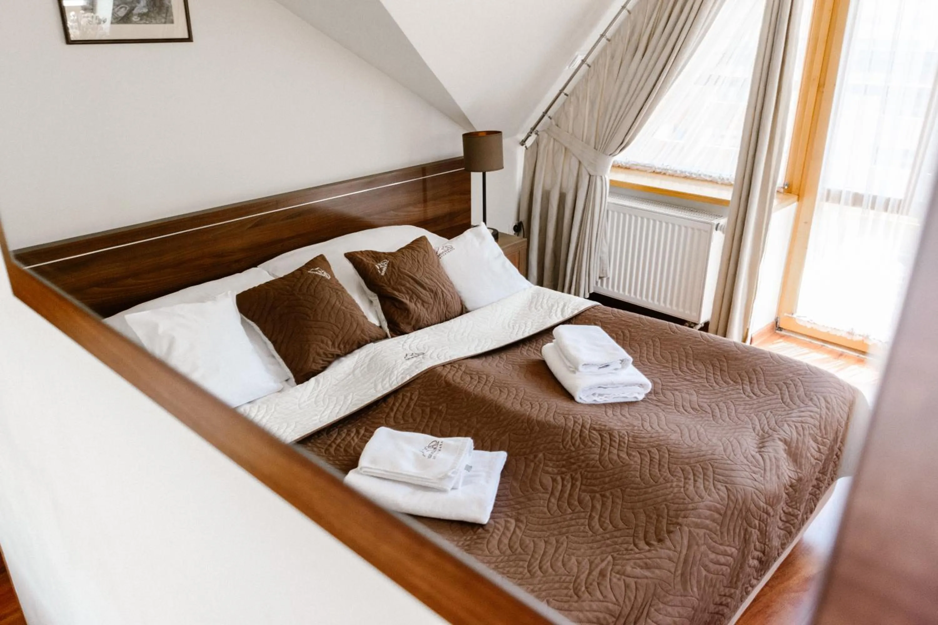 Bed in Aparthotel Bellamonte