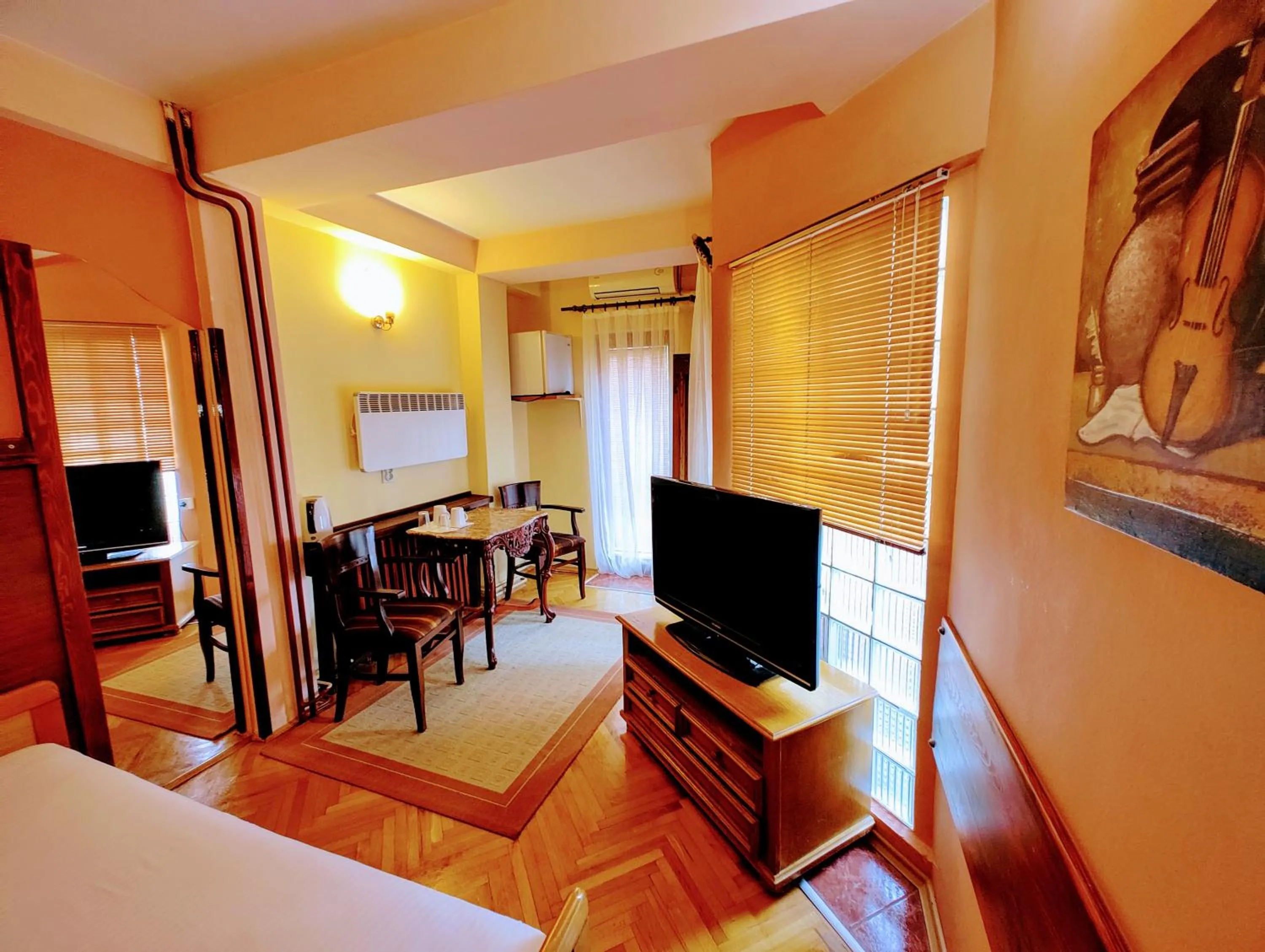 Seating area, Bed in Hotel Kapistec Skopje