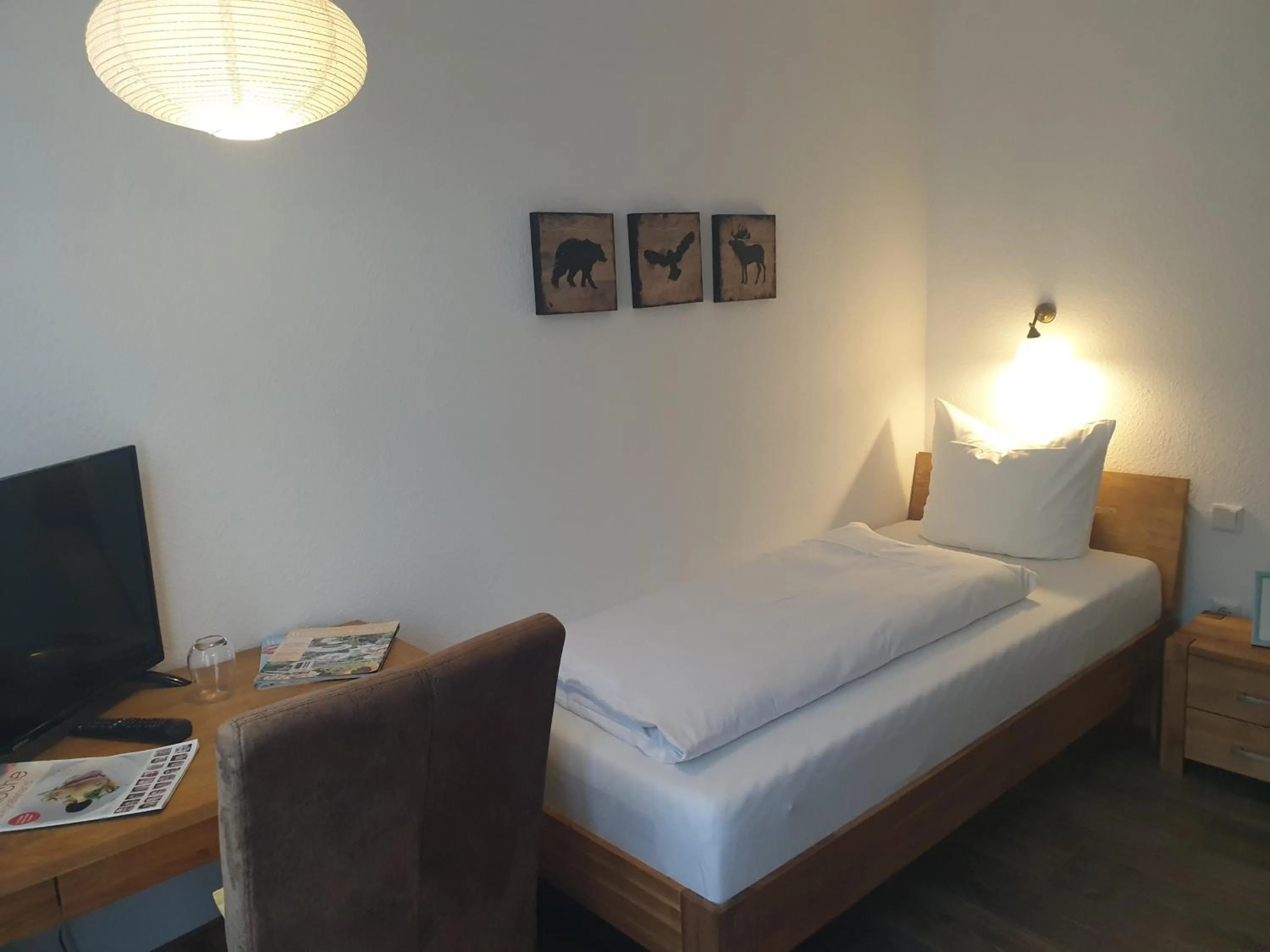Photo of the whole room, Bed in Landgasthof Grüner Baum