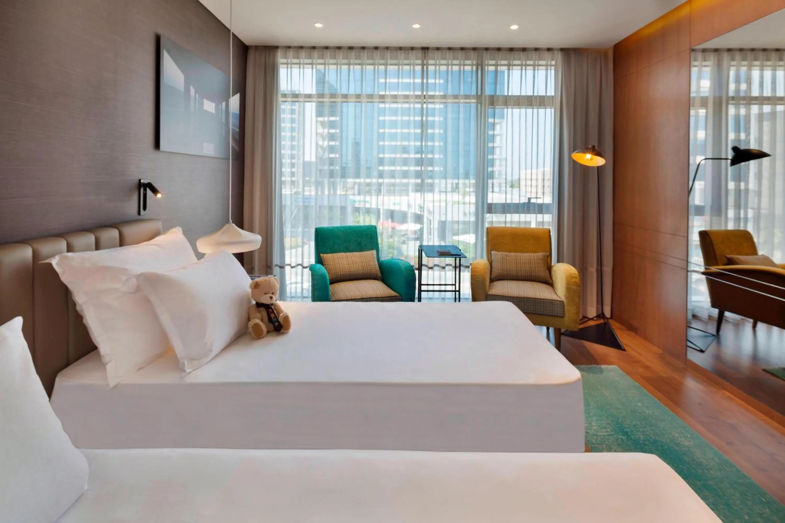 Photo of the whole room, Bed in Publica Isrotel, Autograph Collection