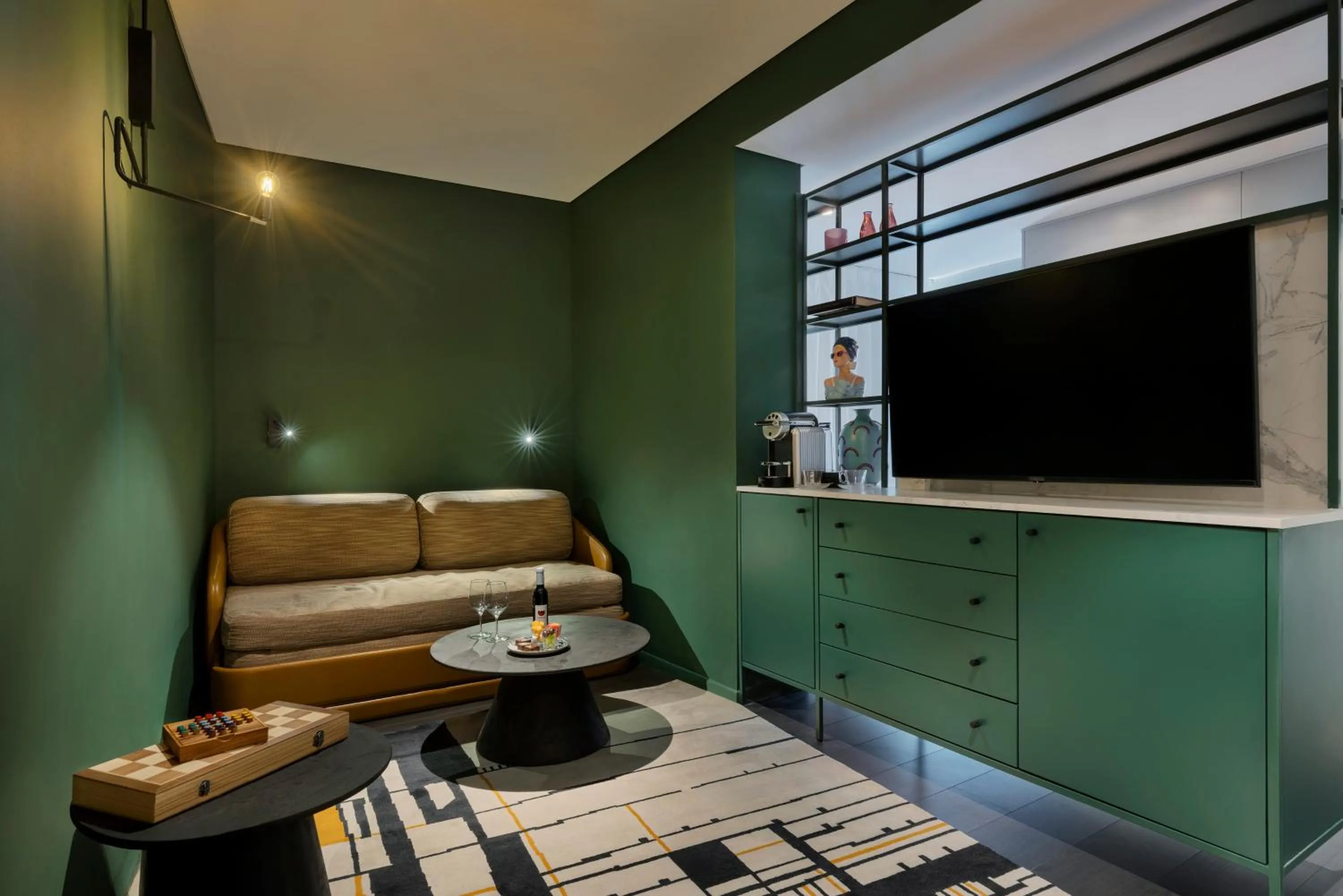 Living room, Bed in Publica Isrotel, Autograph Collection