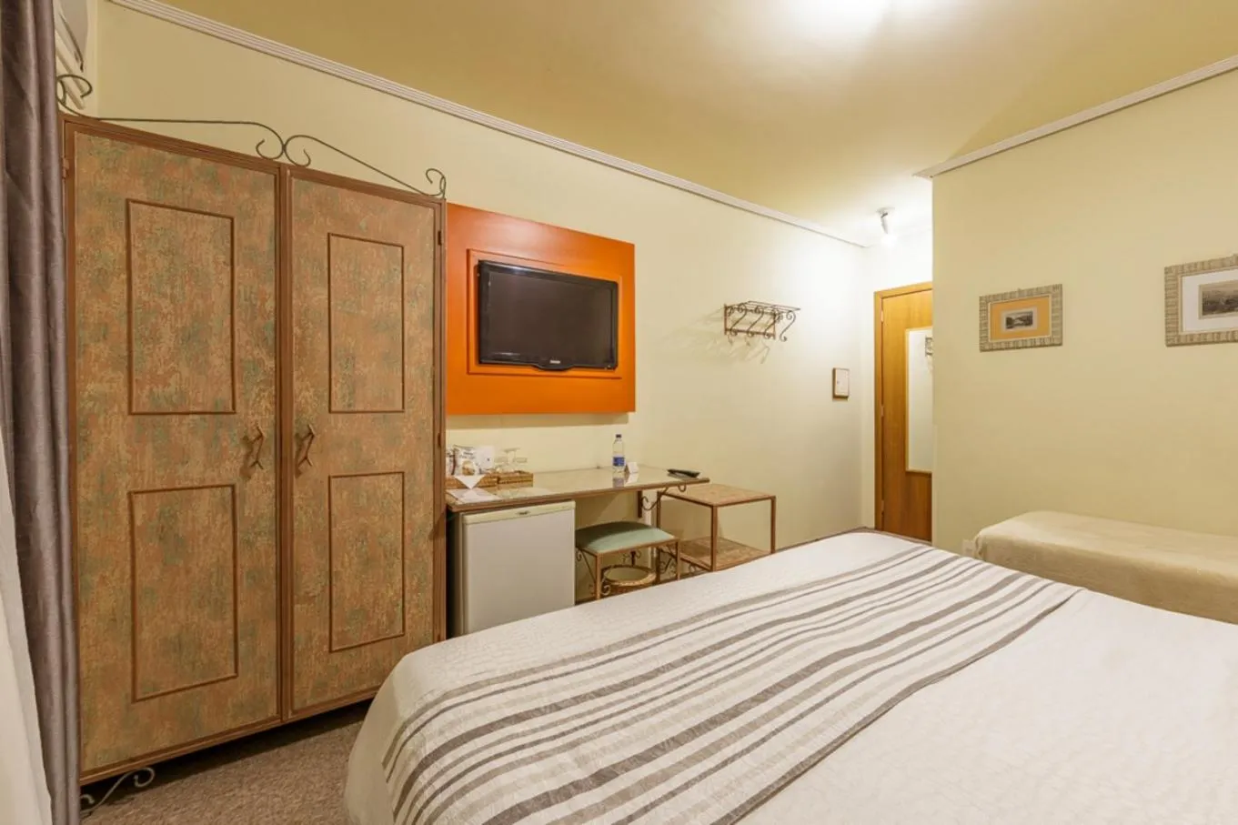 Bed in Hotel Pousada Le Chateau