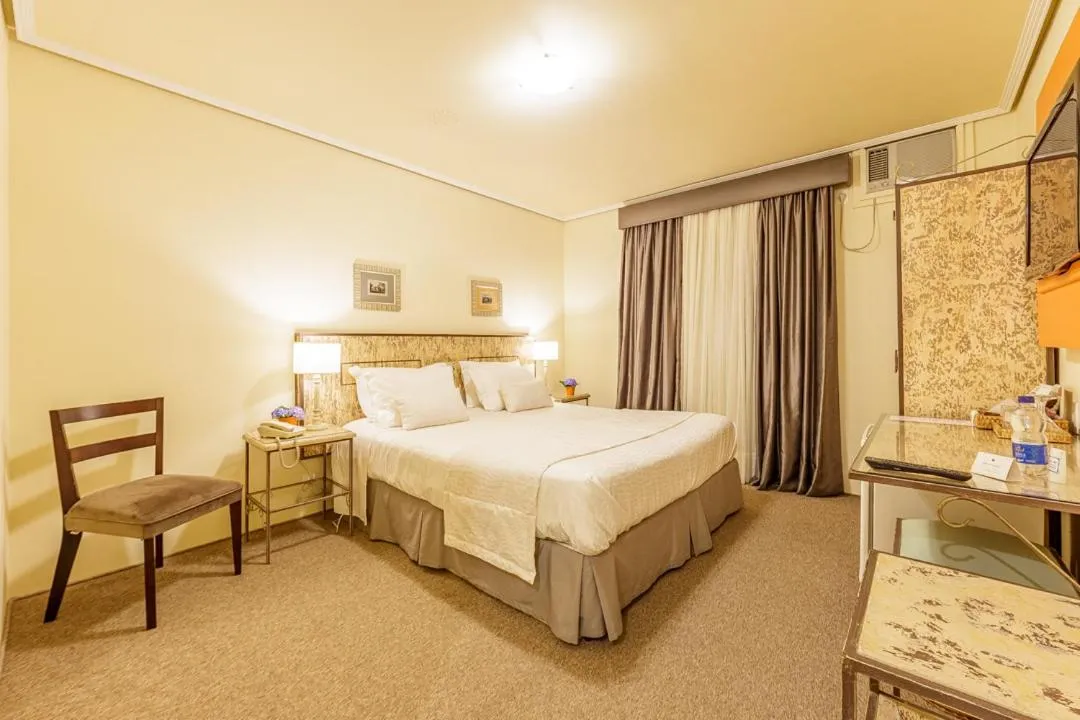 Bed in Hotel Pousada Le Chateau