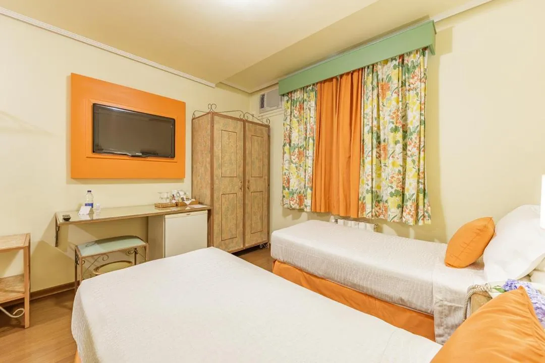 Bed in Hotel Pousada Le Chateau