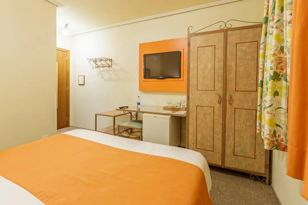 Bed in Hotel Pousada Le Chateau