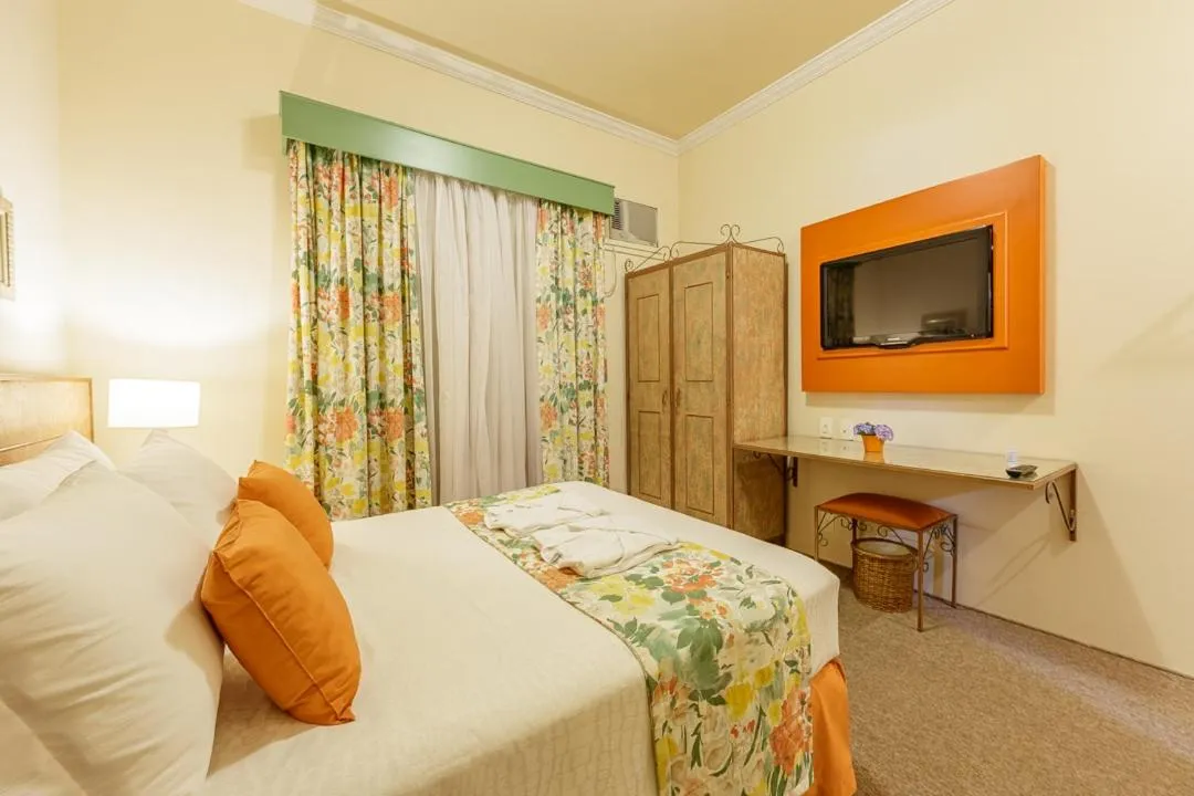 Bed in Hotel Pousada Le Chateau