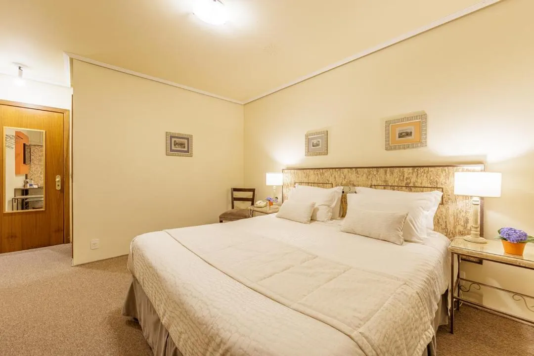 Bed in Hotel Pousada Le Chateau