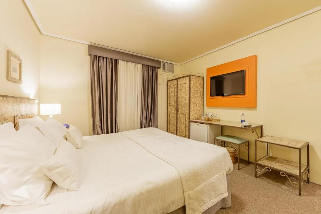 Bed in Hotel Pousada Le Chateau